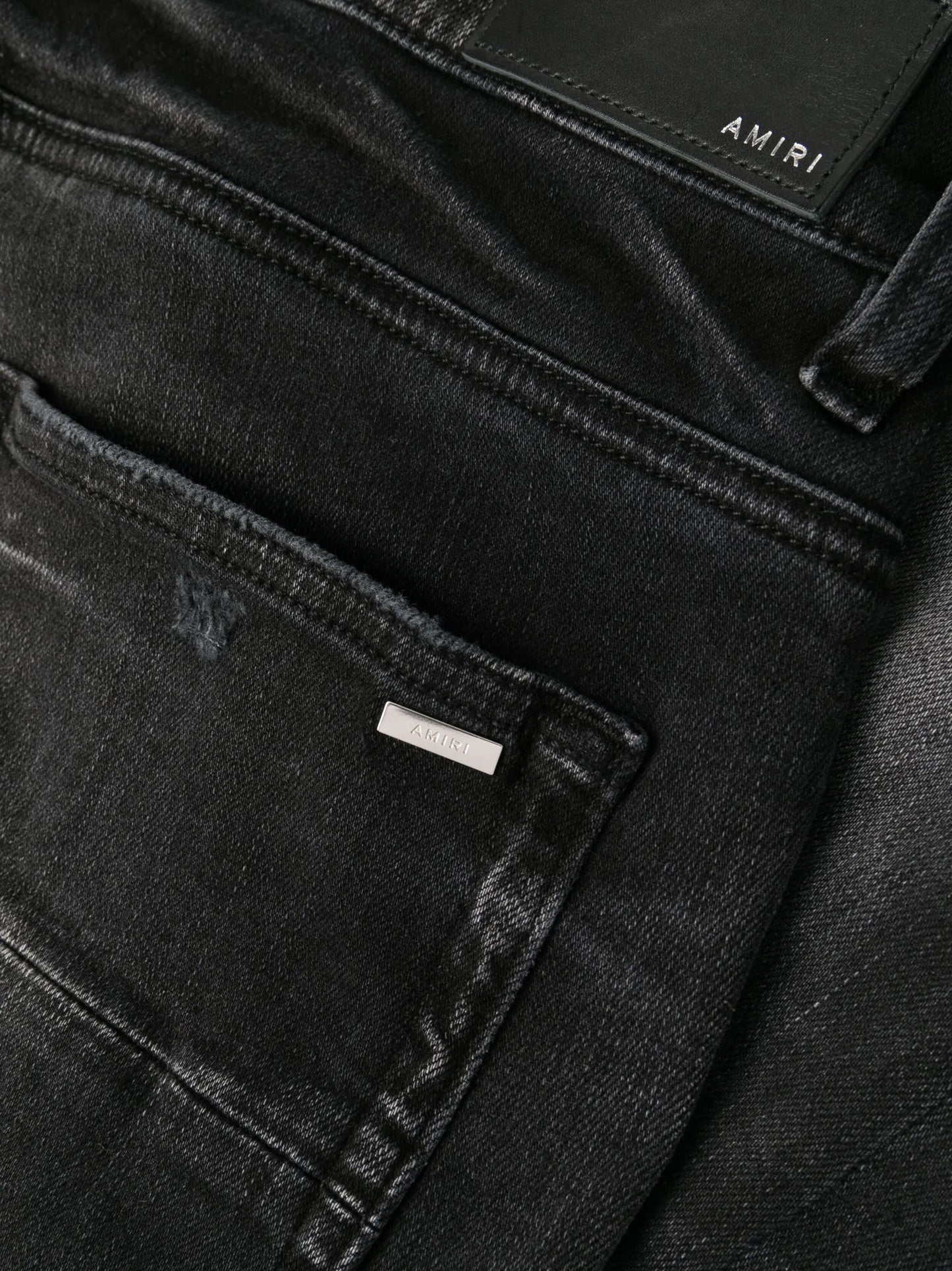 Stack whiskered skinny jeans