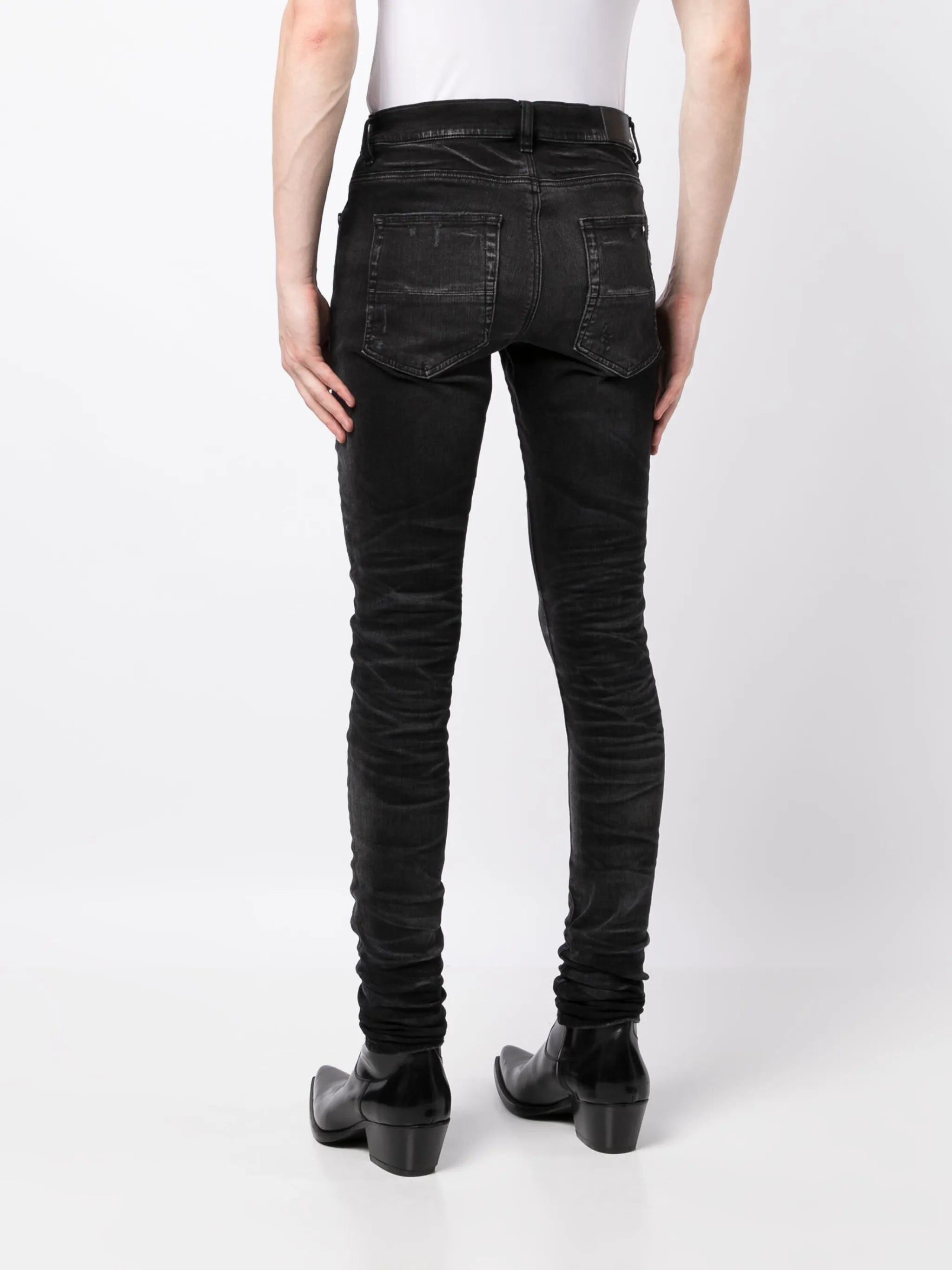 Stack whiskered skinny jeans