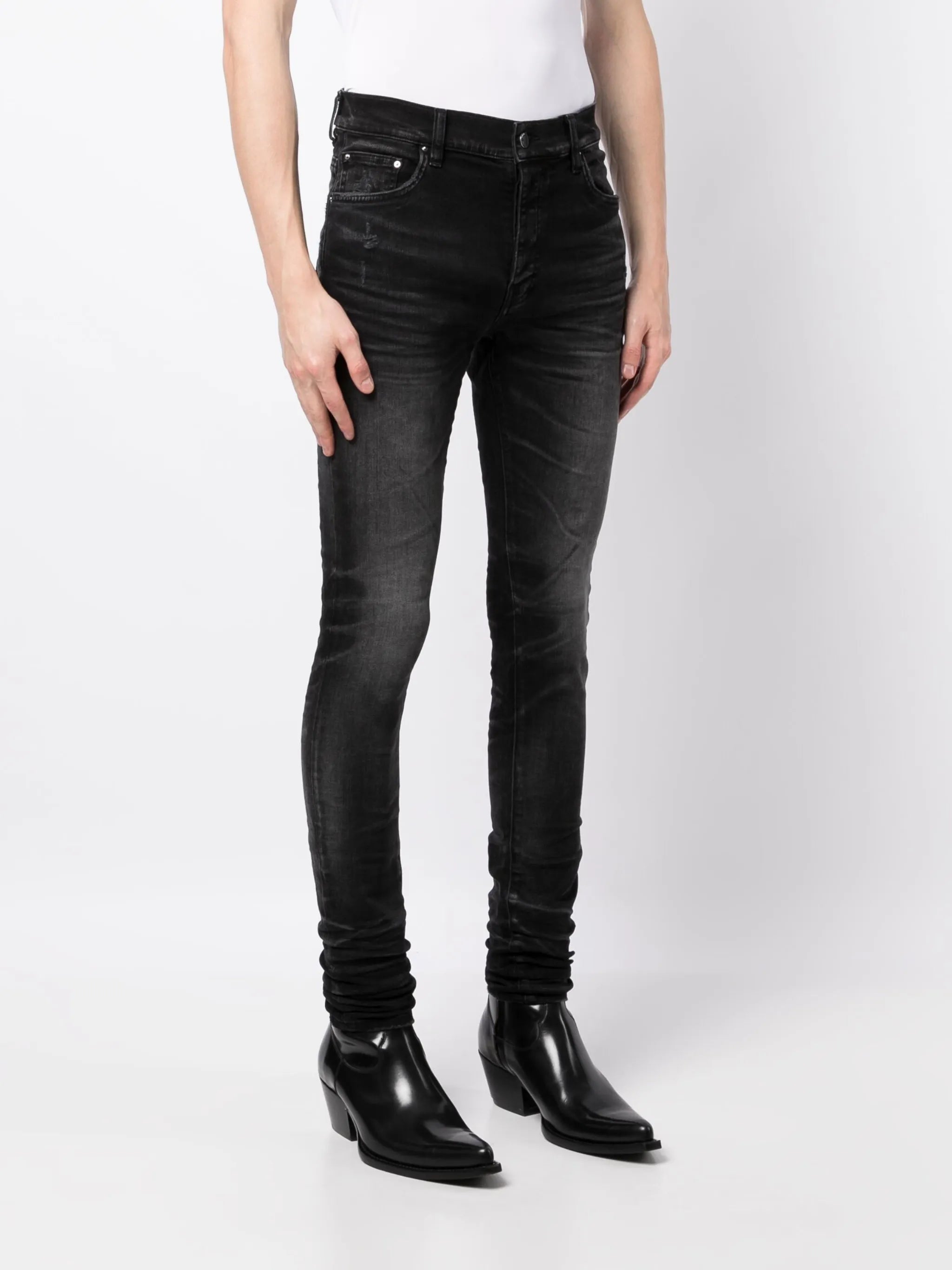 Stack whiskered skinny jeans
