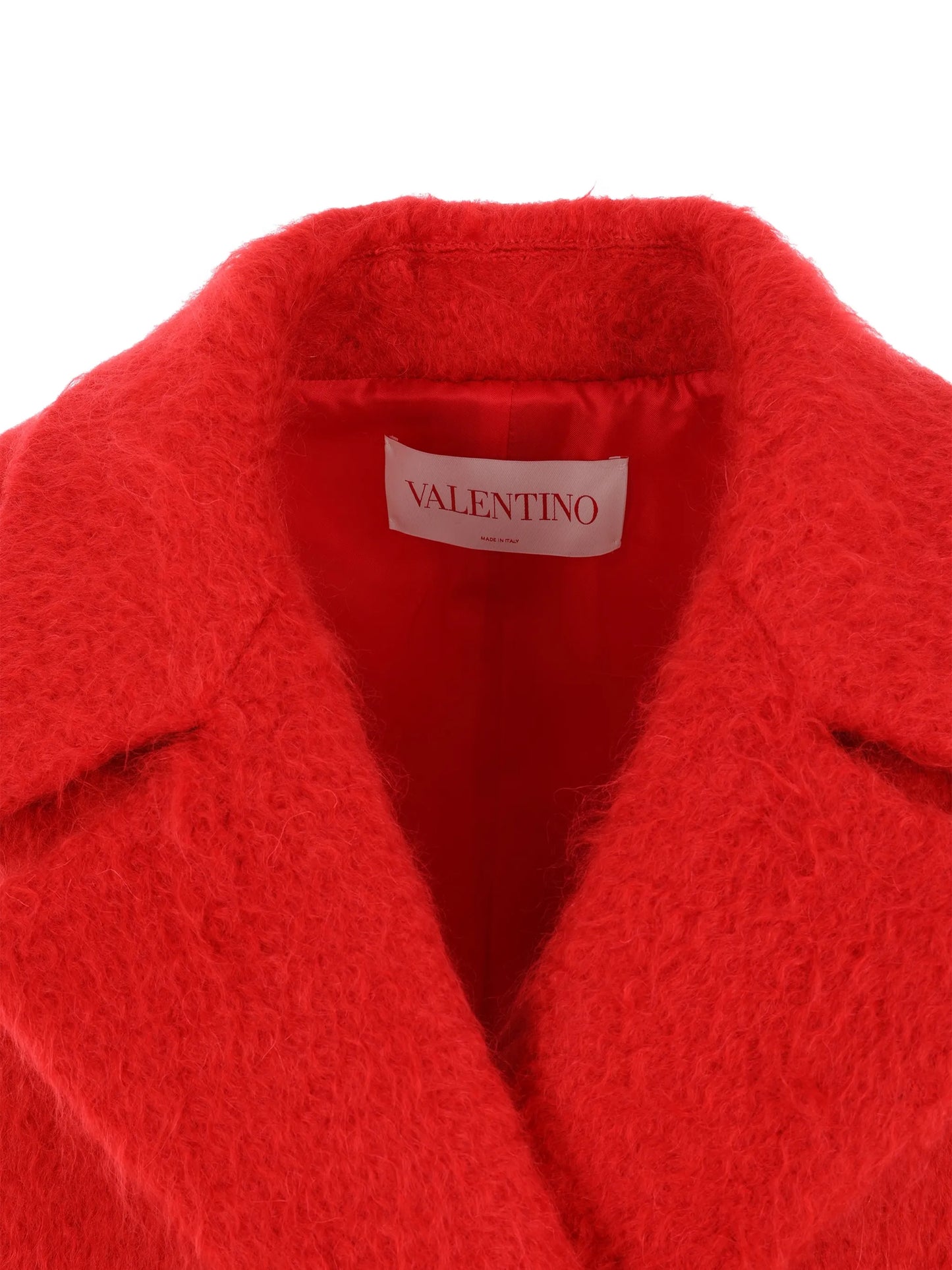 Uncoated double-breasted bouclé coat