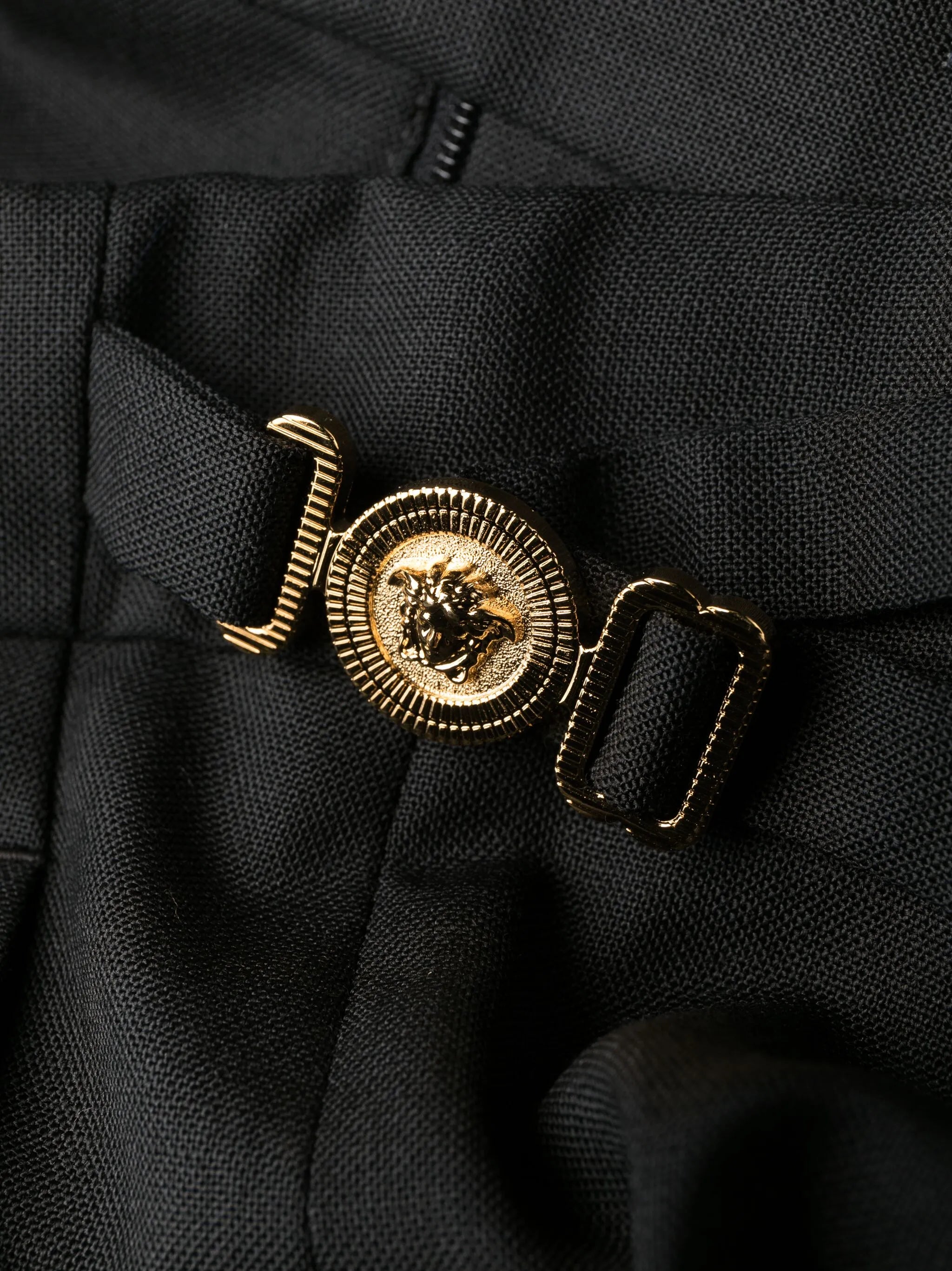 Medusa-plaque tailored wool trousers