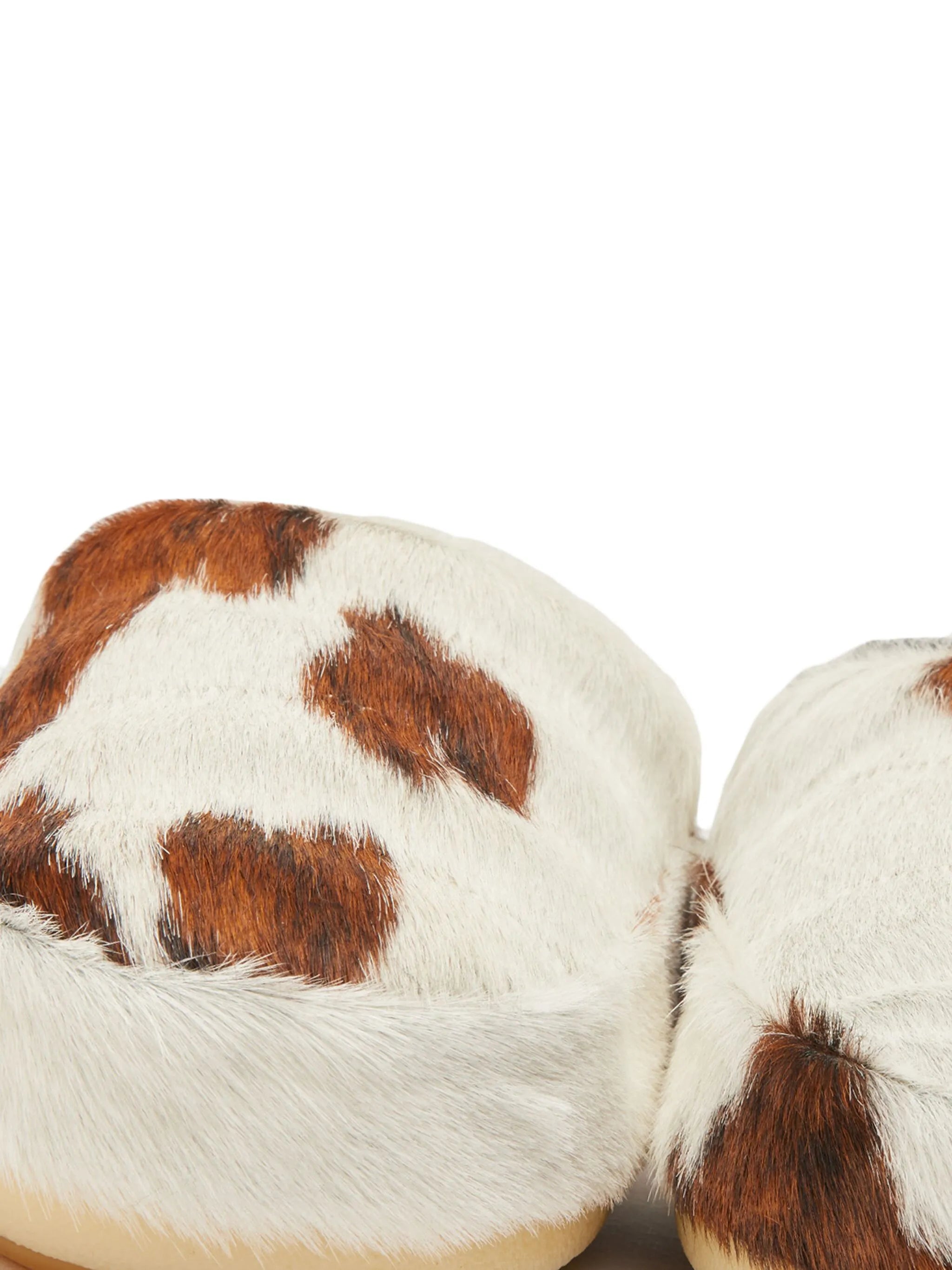 cow-print pony hair mules
