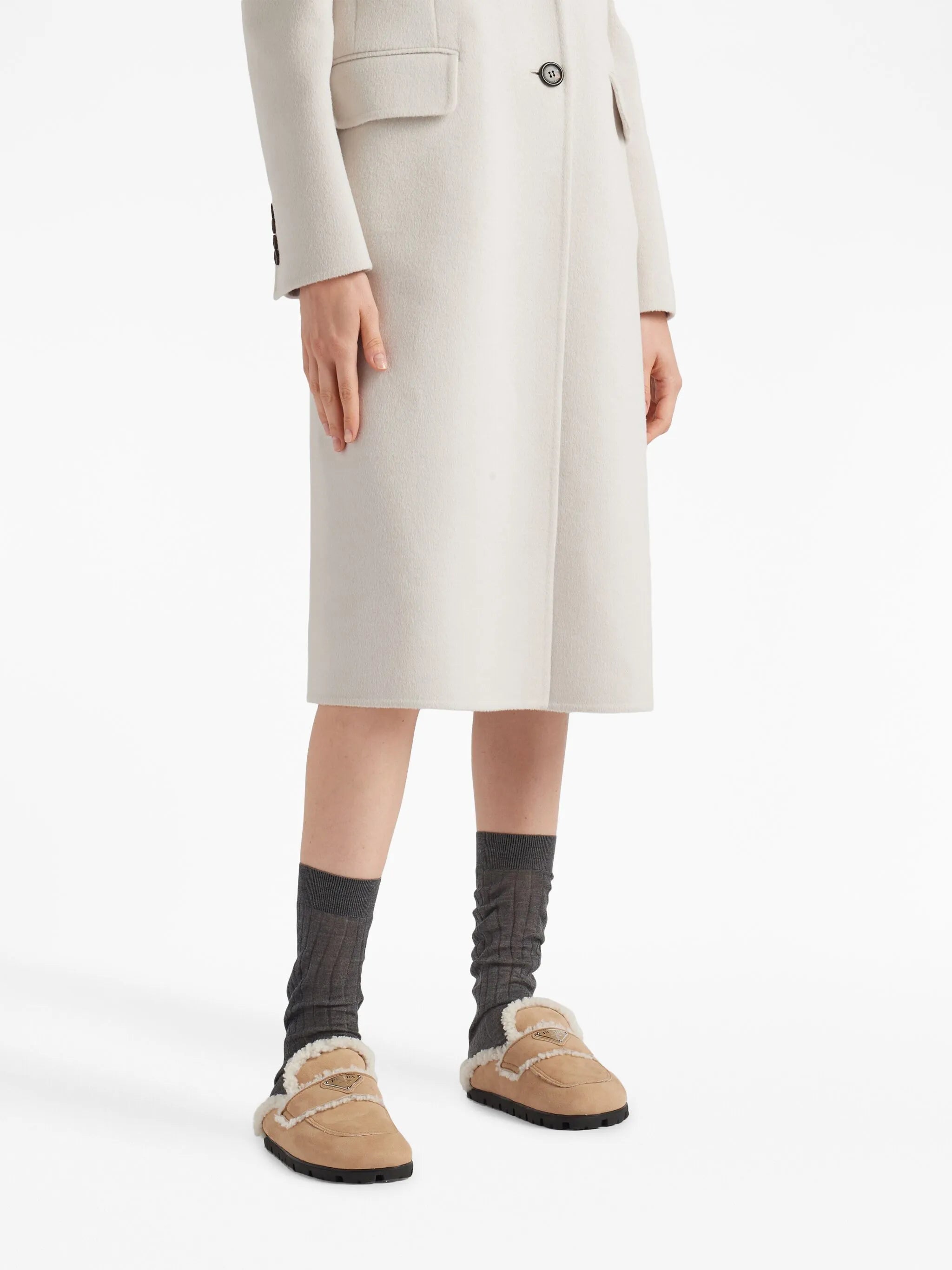 triangle-logo shearling slippers