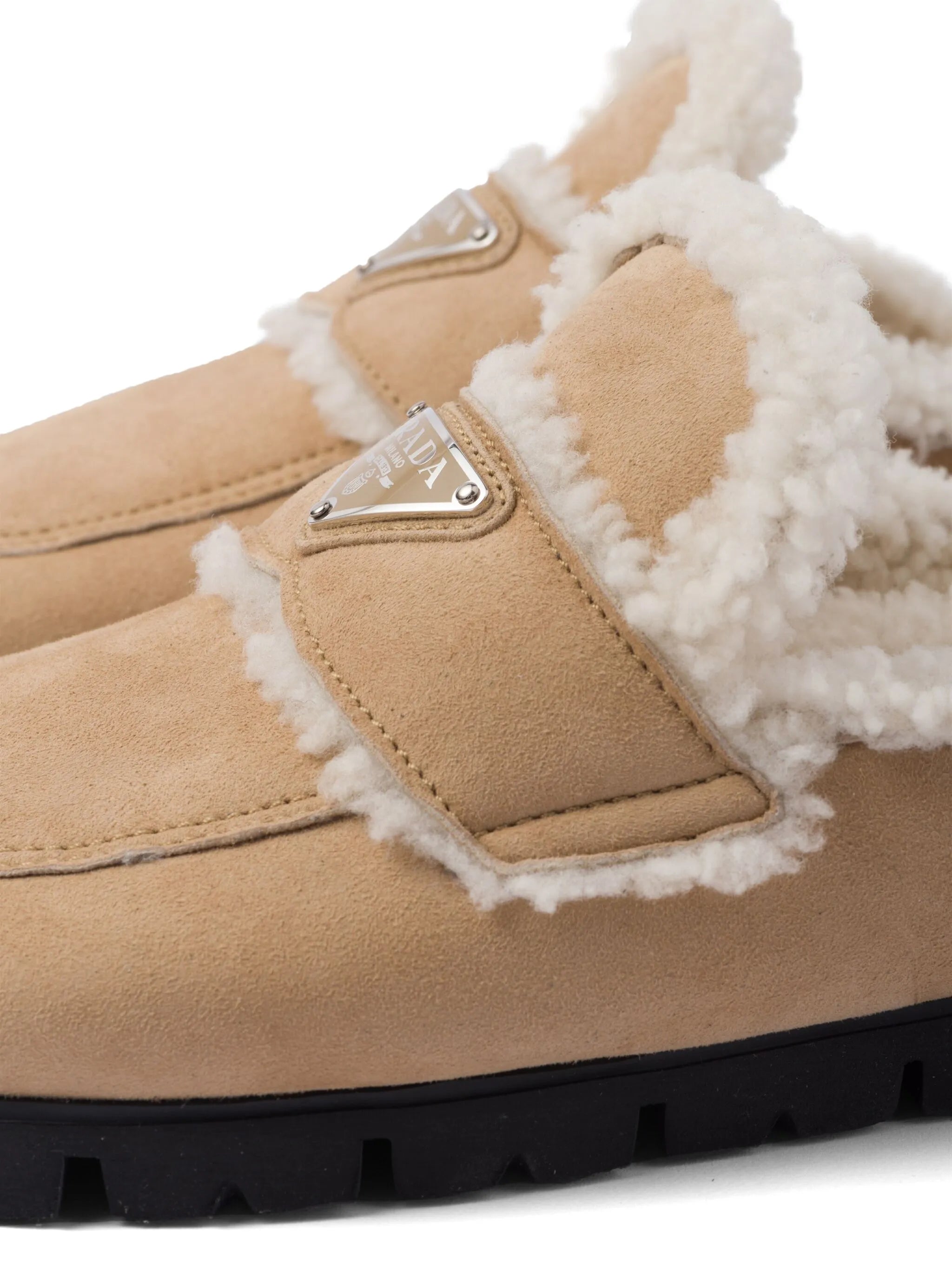 triangle-logo shearling slippers