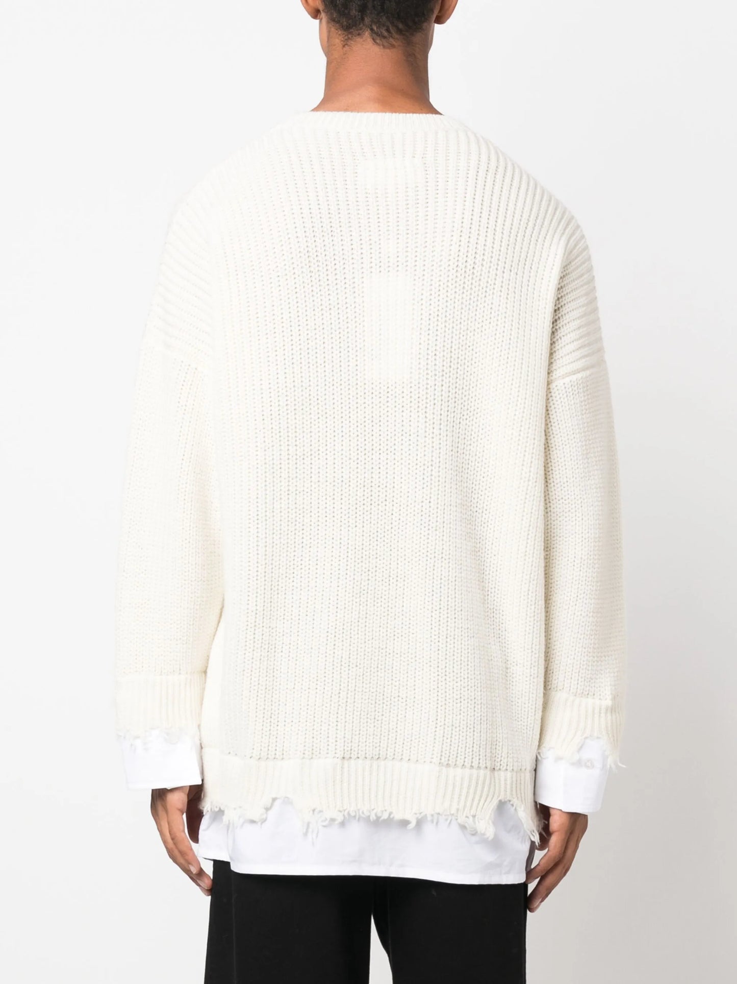 layered distressed crochet-knit jumper