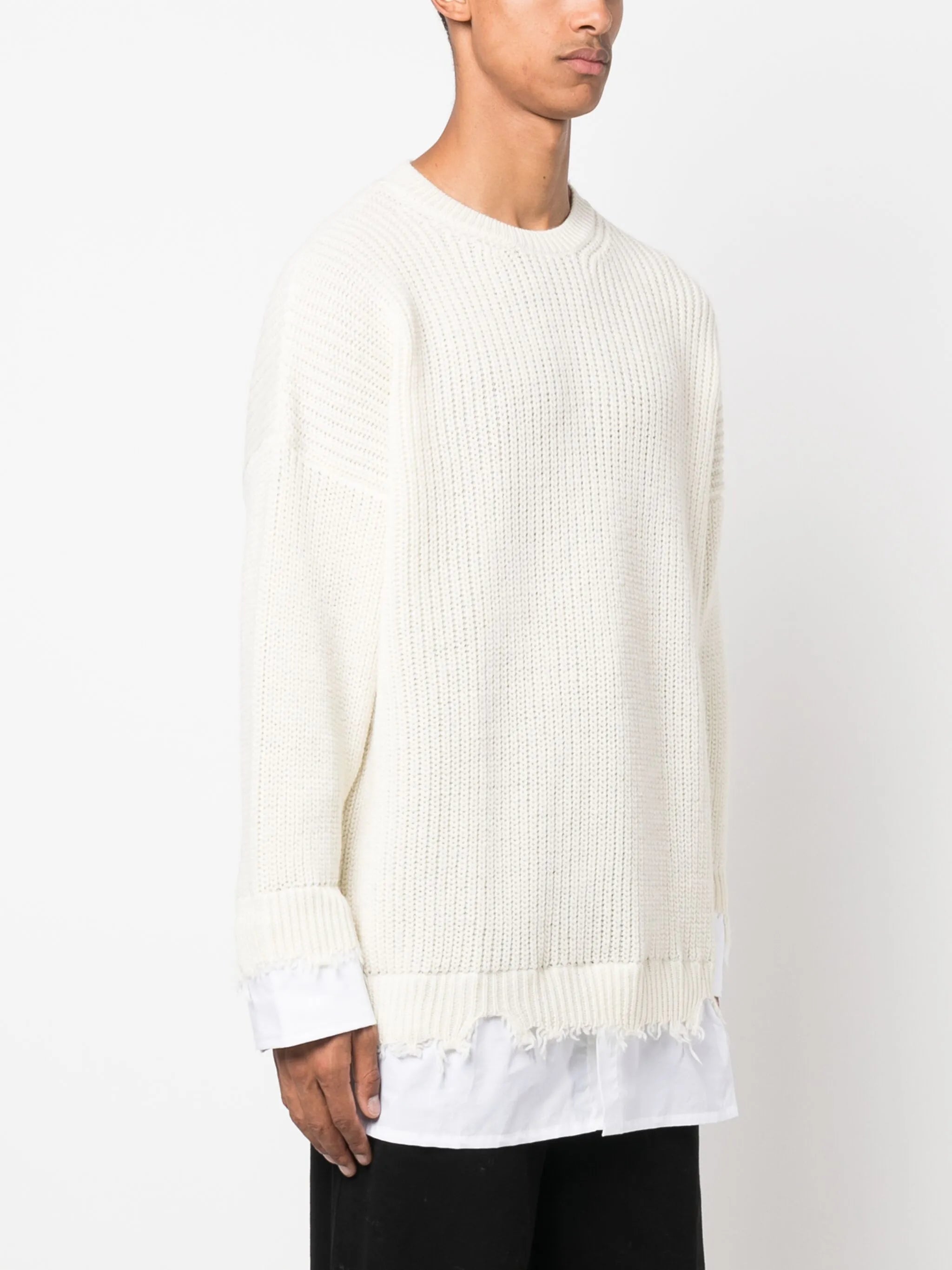 layered distressed crochet-knit jumper