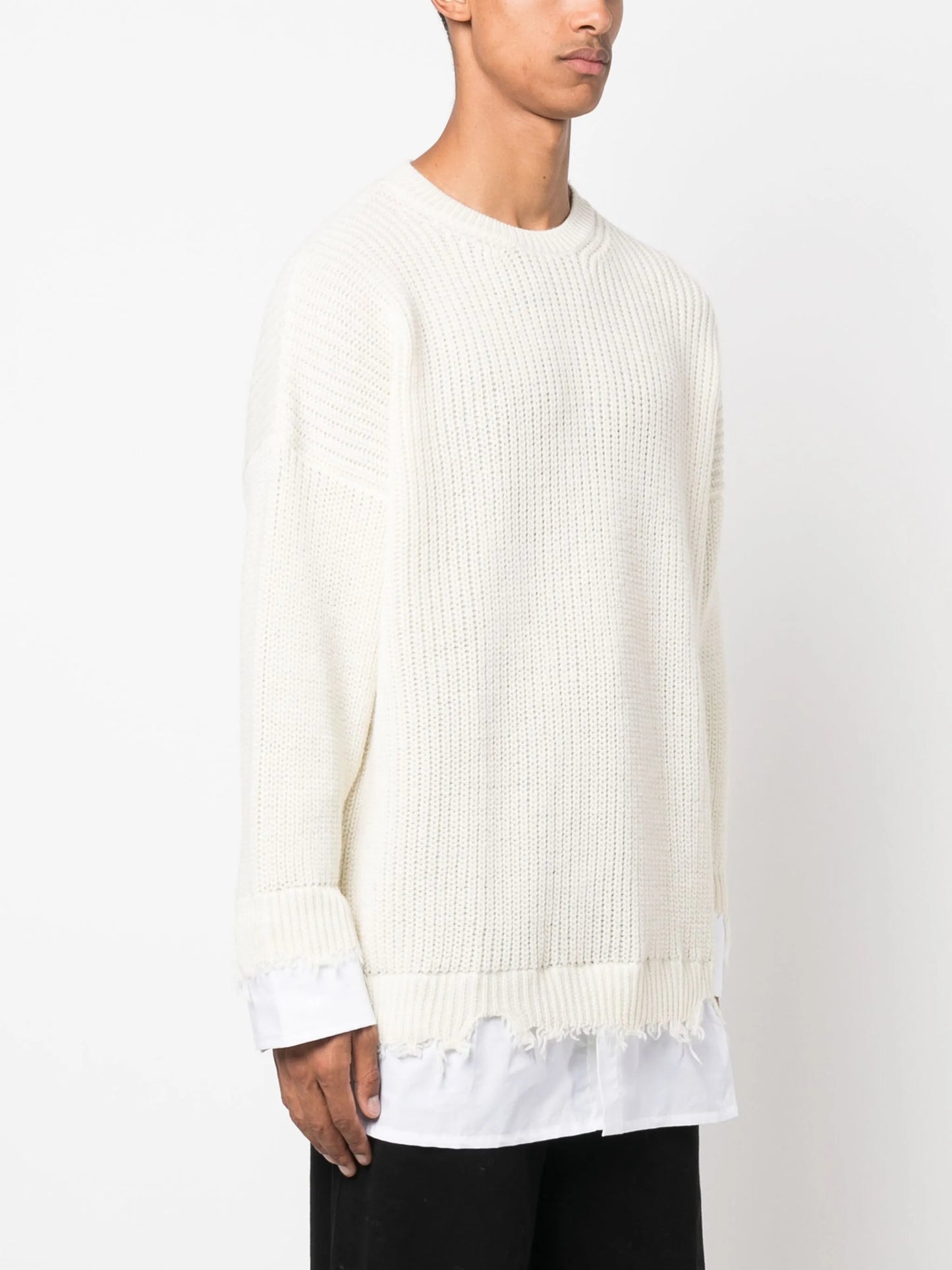 layered distressed crochet-knit jumper