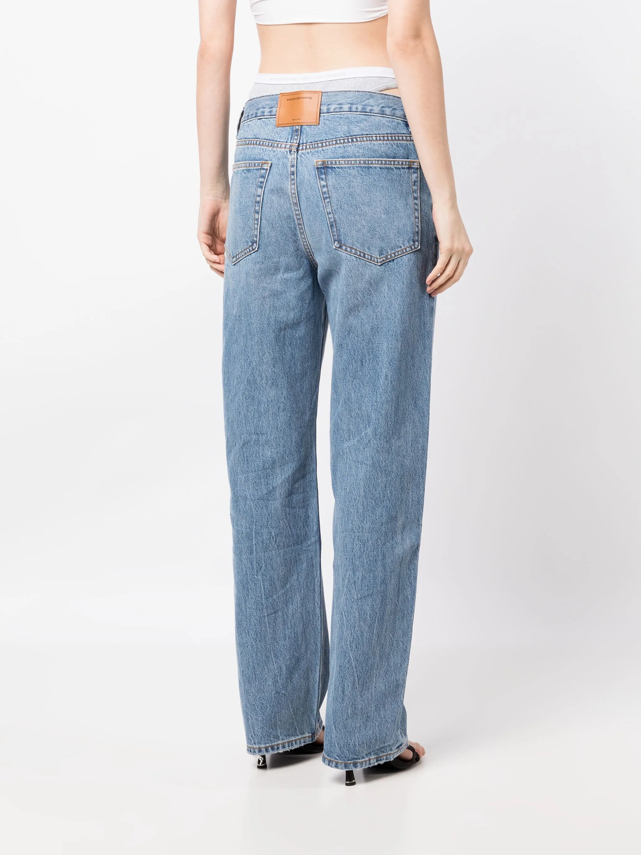 layered straight-leg jeans