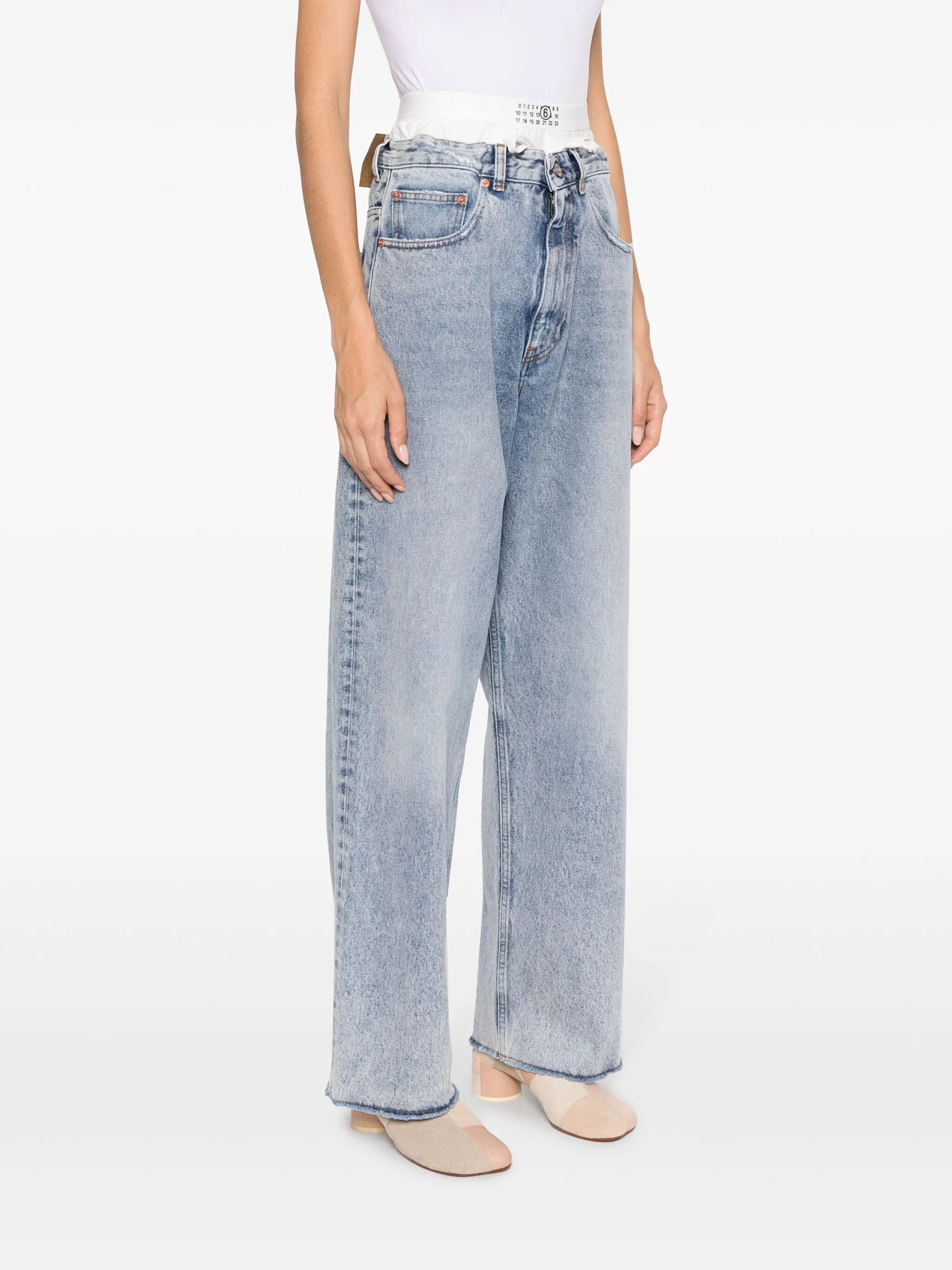 layered wide-leg jeans