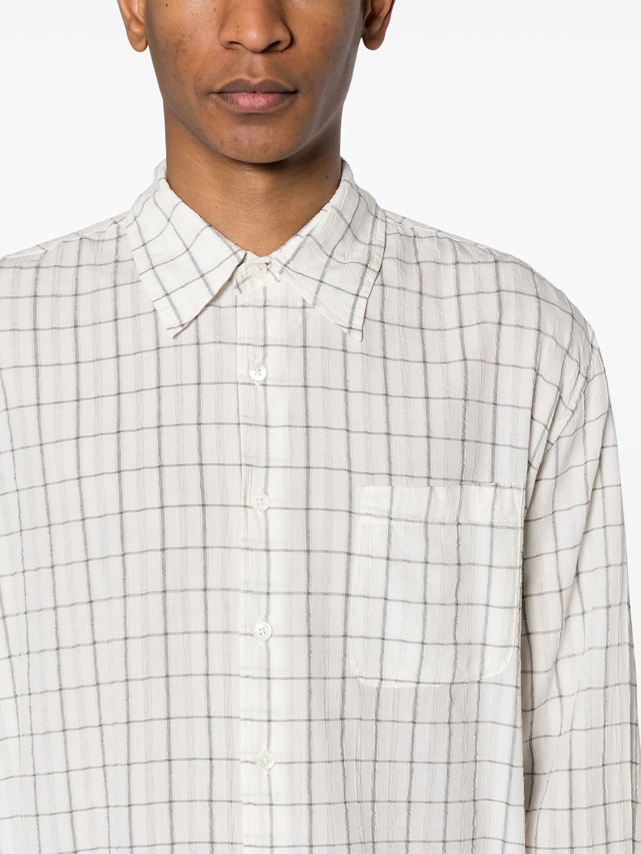 Above checked shirt