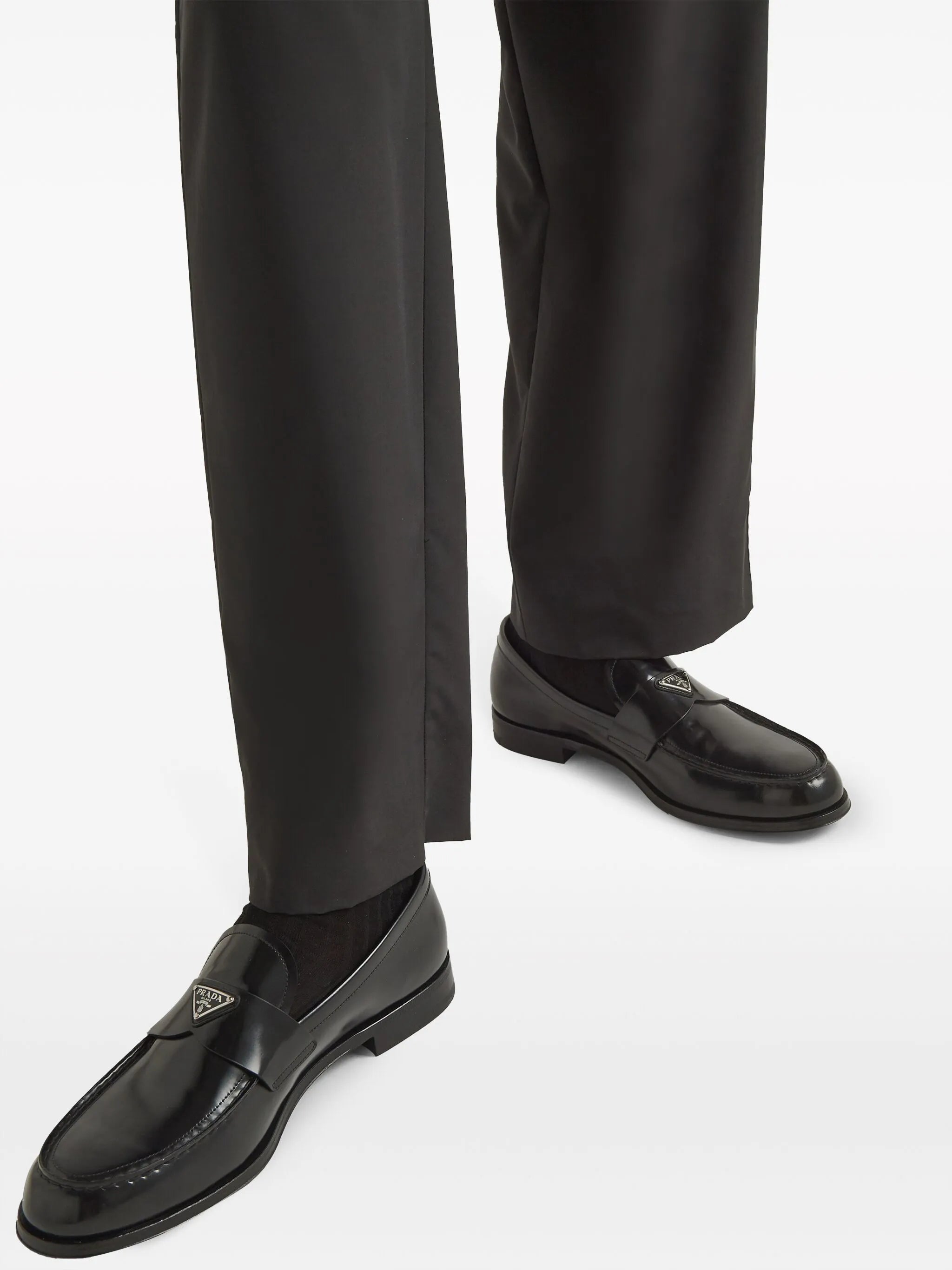 triangle-logo leather loafers