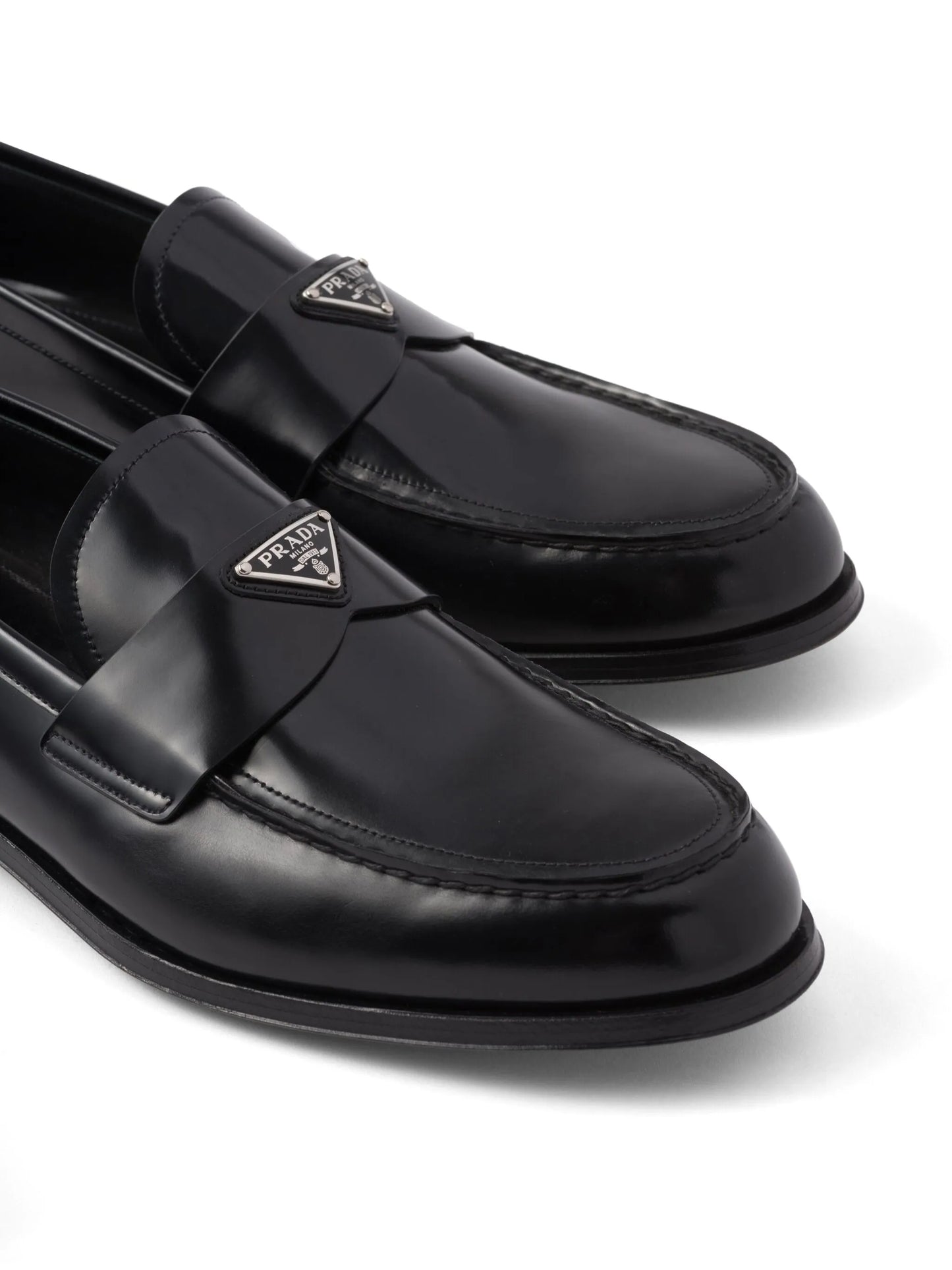 triangle-logo leather loafers