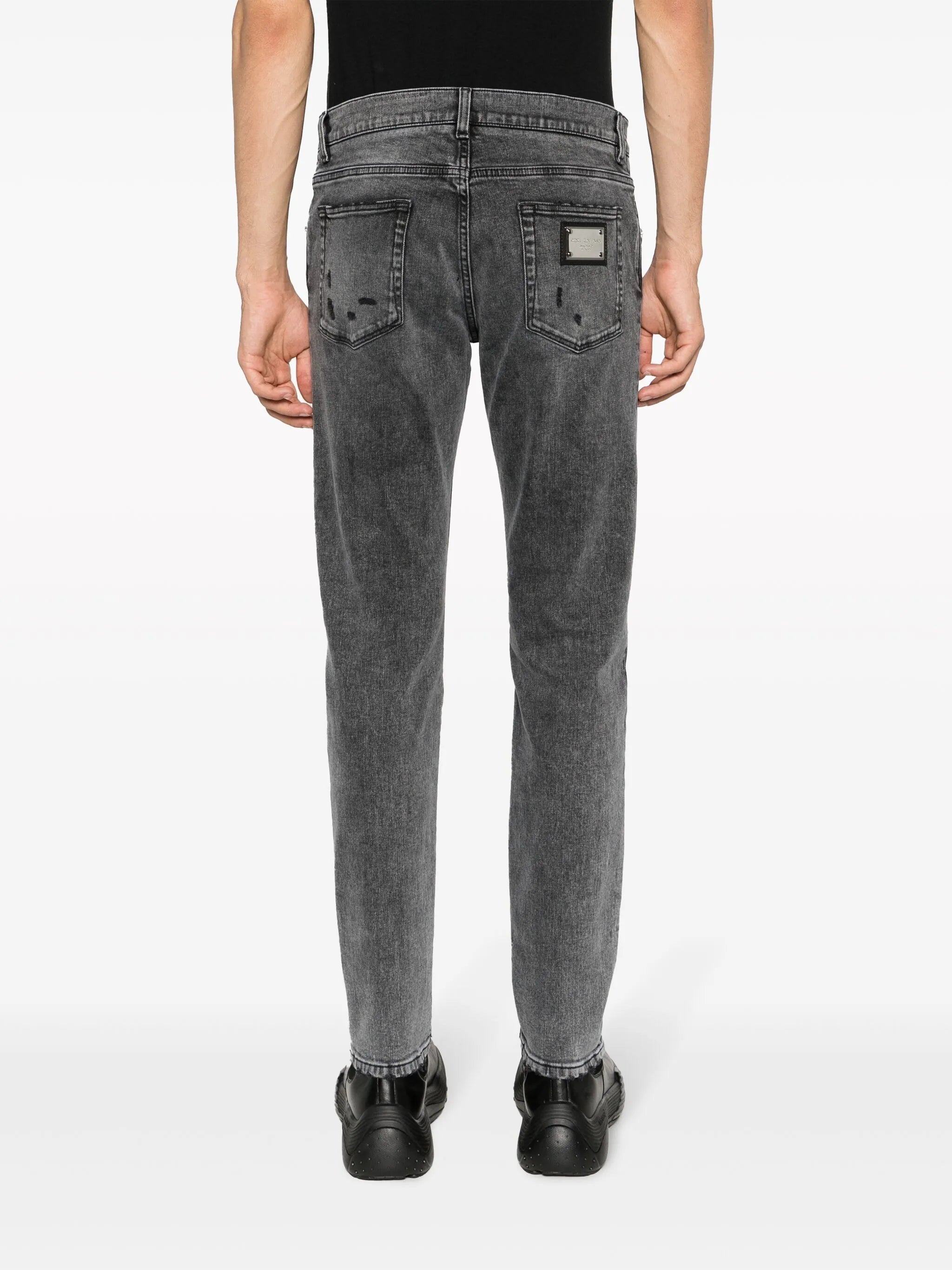 stonewashed slim-fit jeans