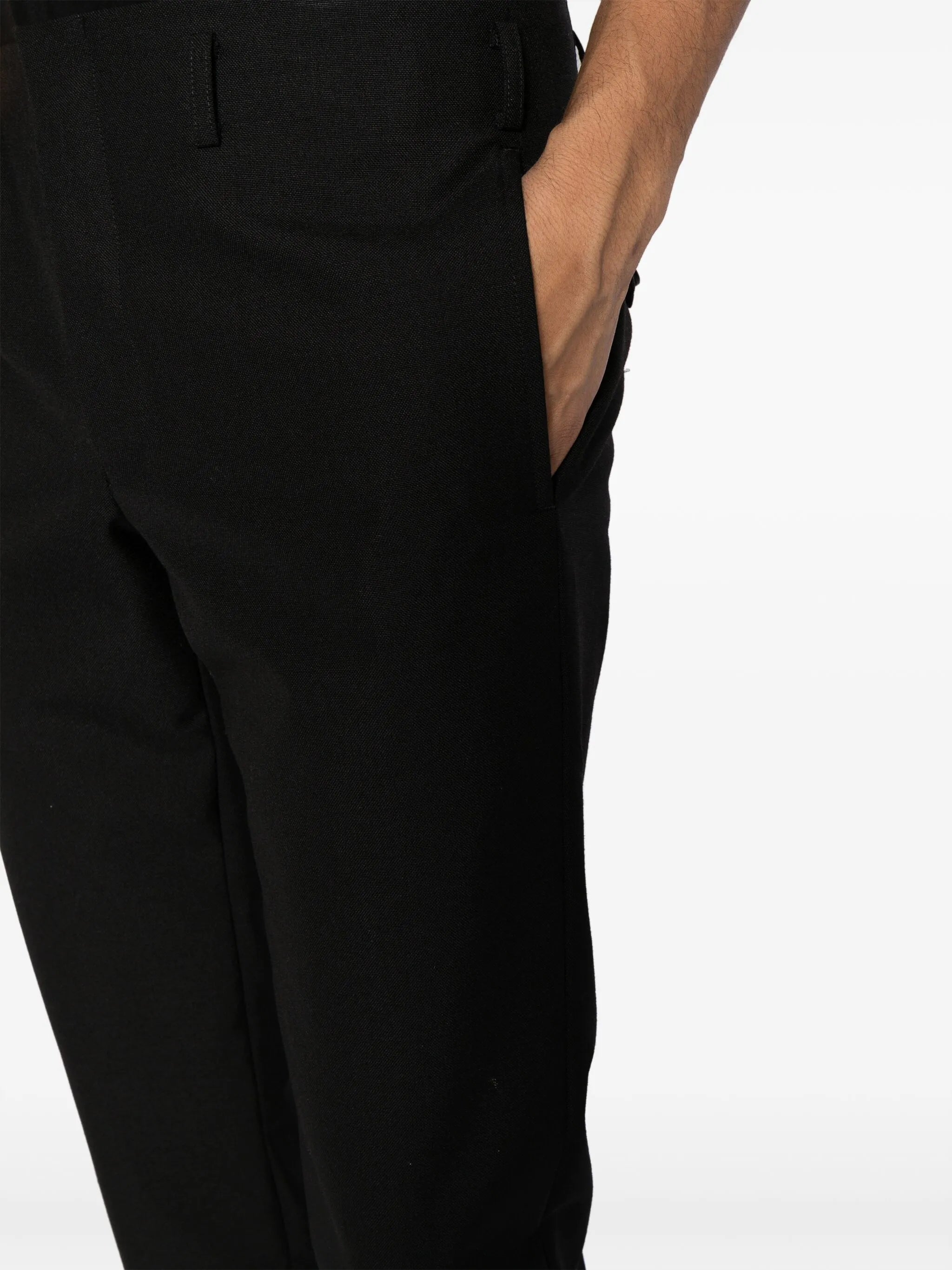 pressed-crease tailored trousers