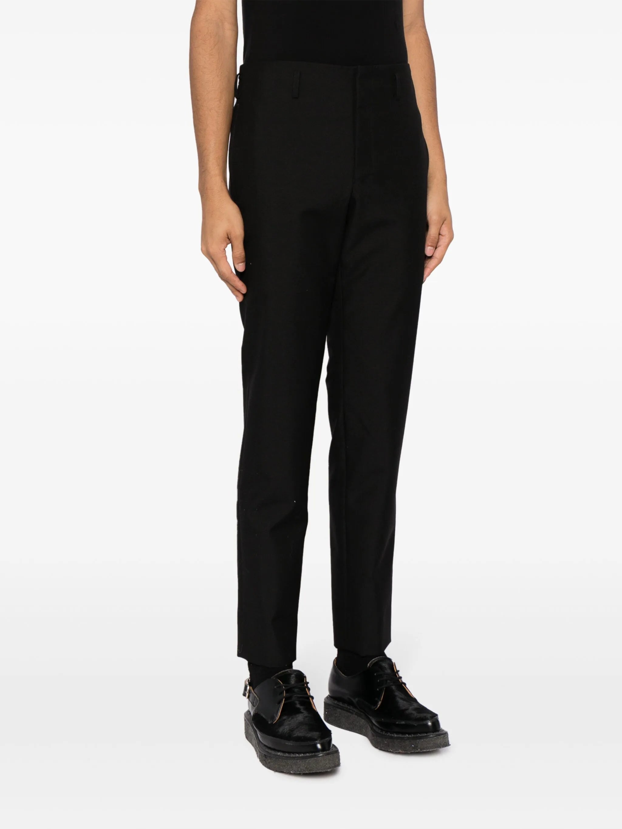 pressed-crease tailored trousers