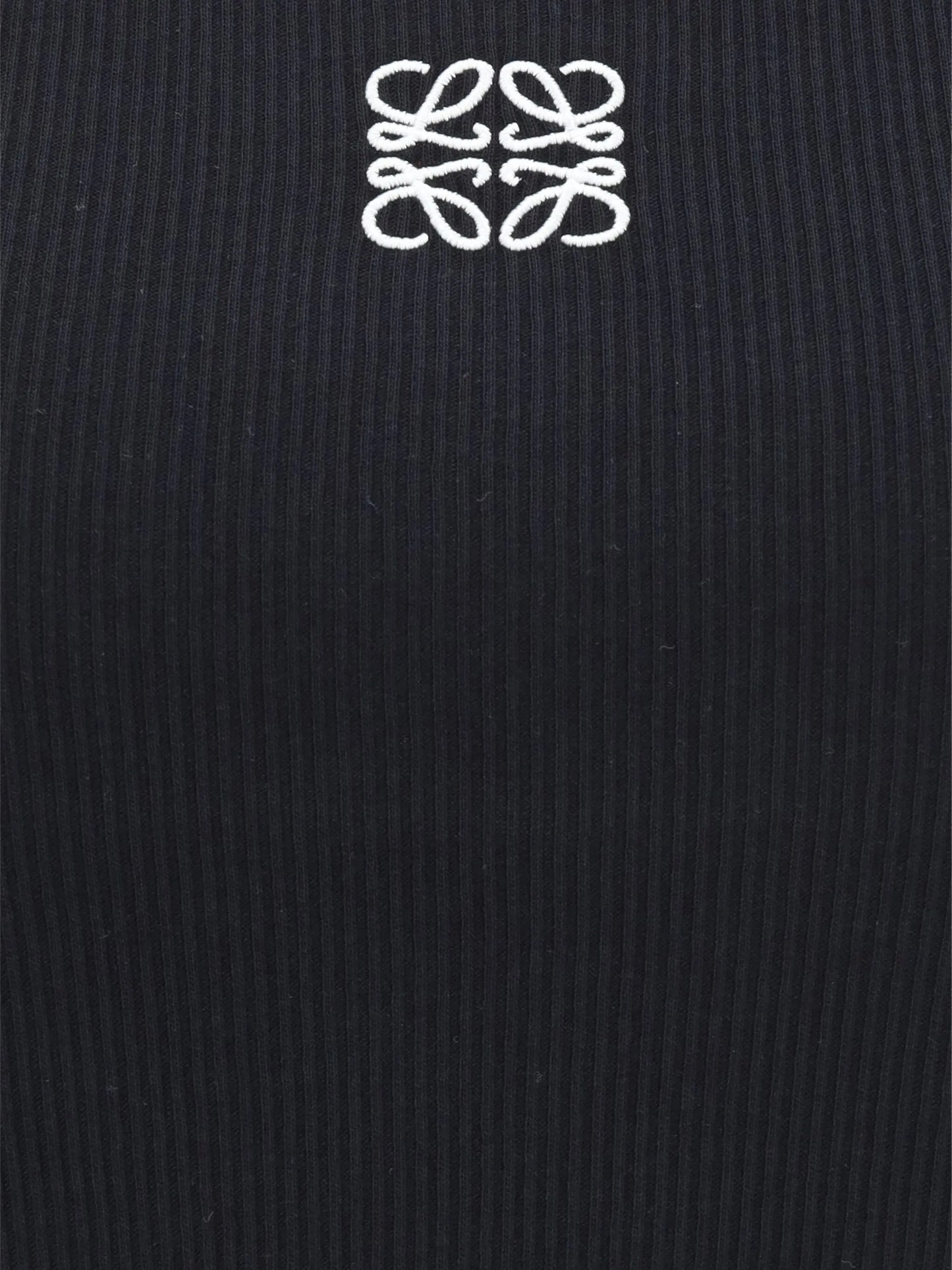 Anagram-embroidered top