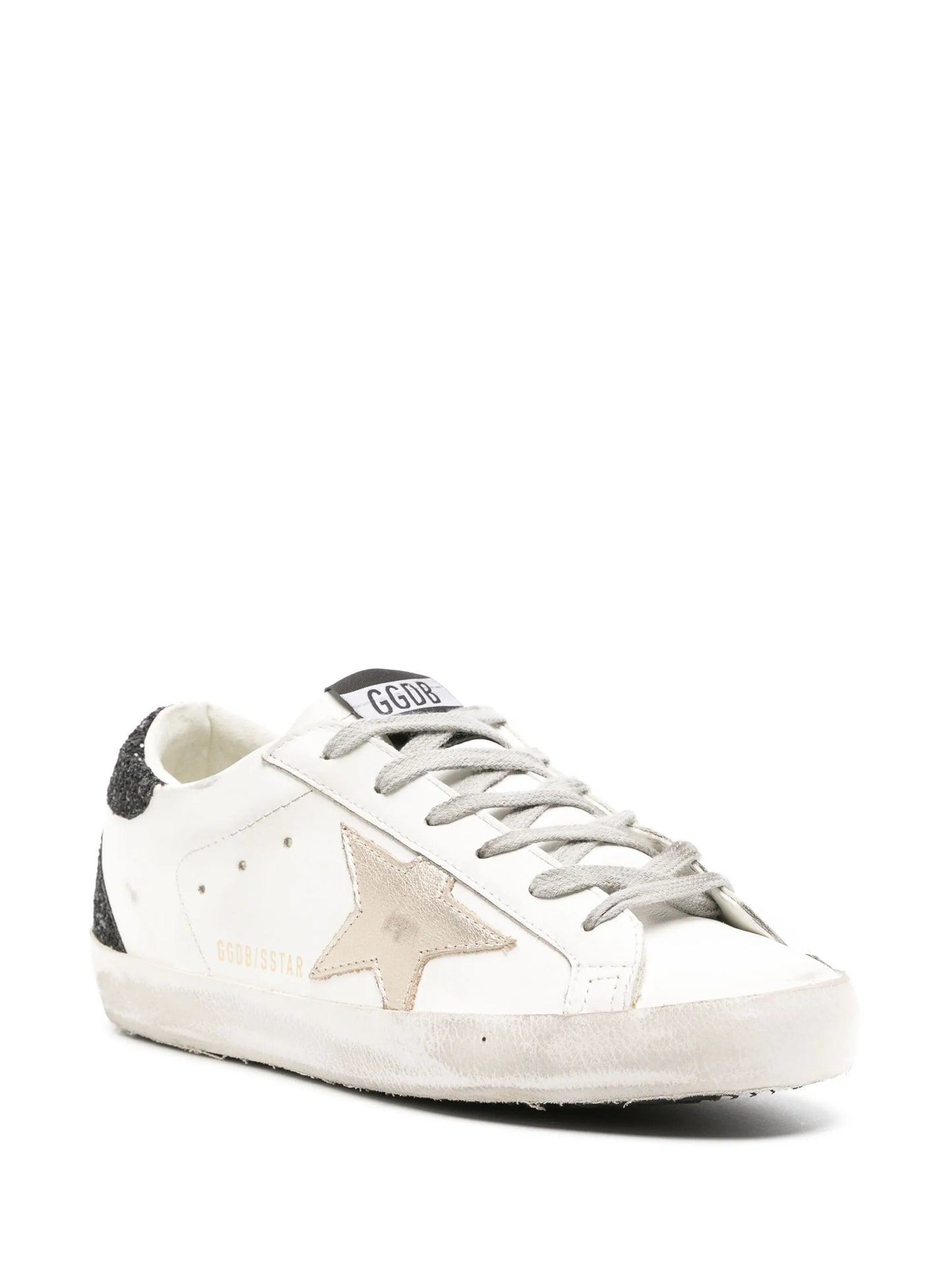 Super-Star trainers with gold star and black glitter heel tab