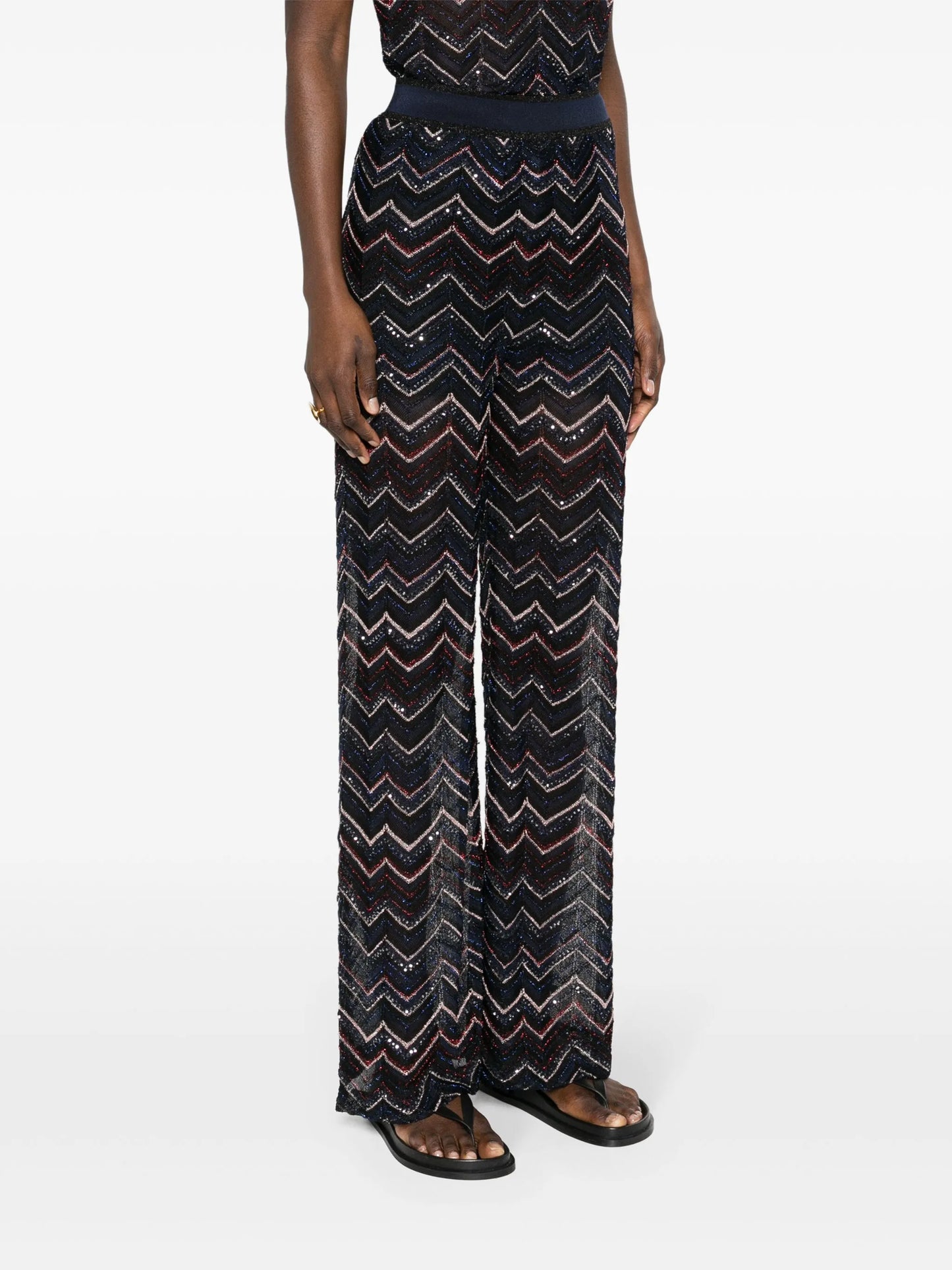flared chevron-knit trousers