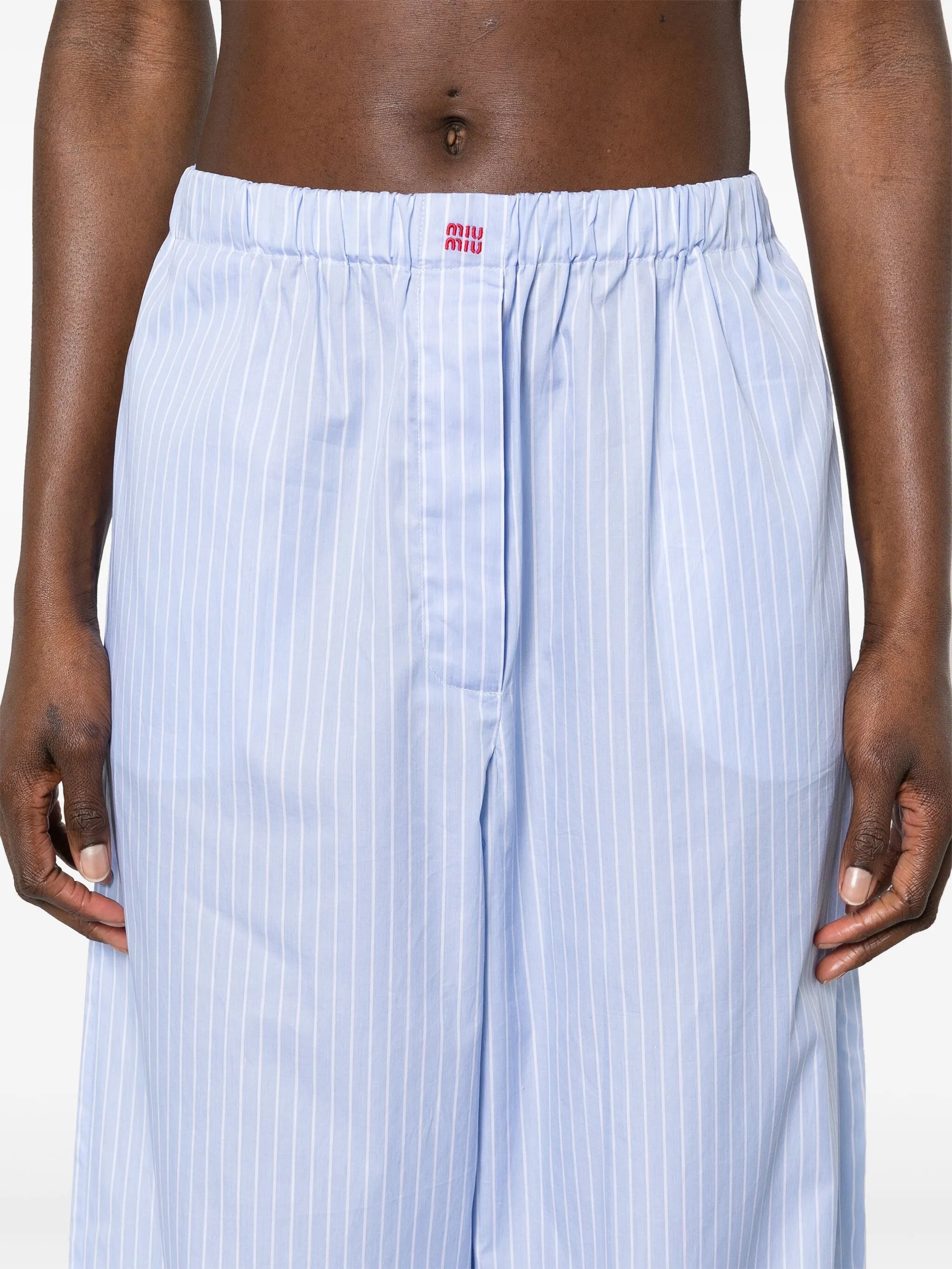 pinstriped wide-leg trousers