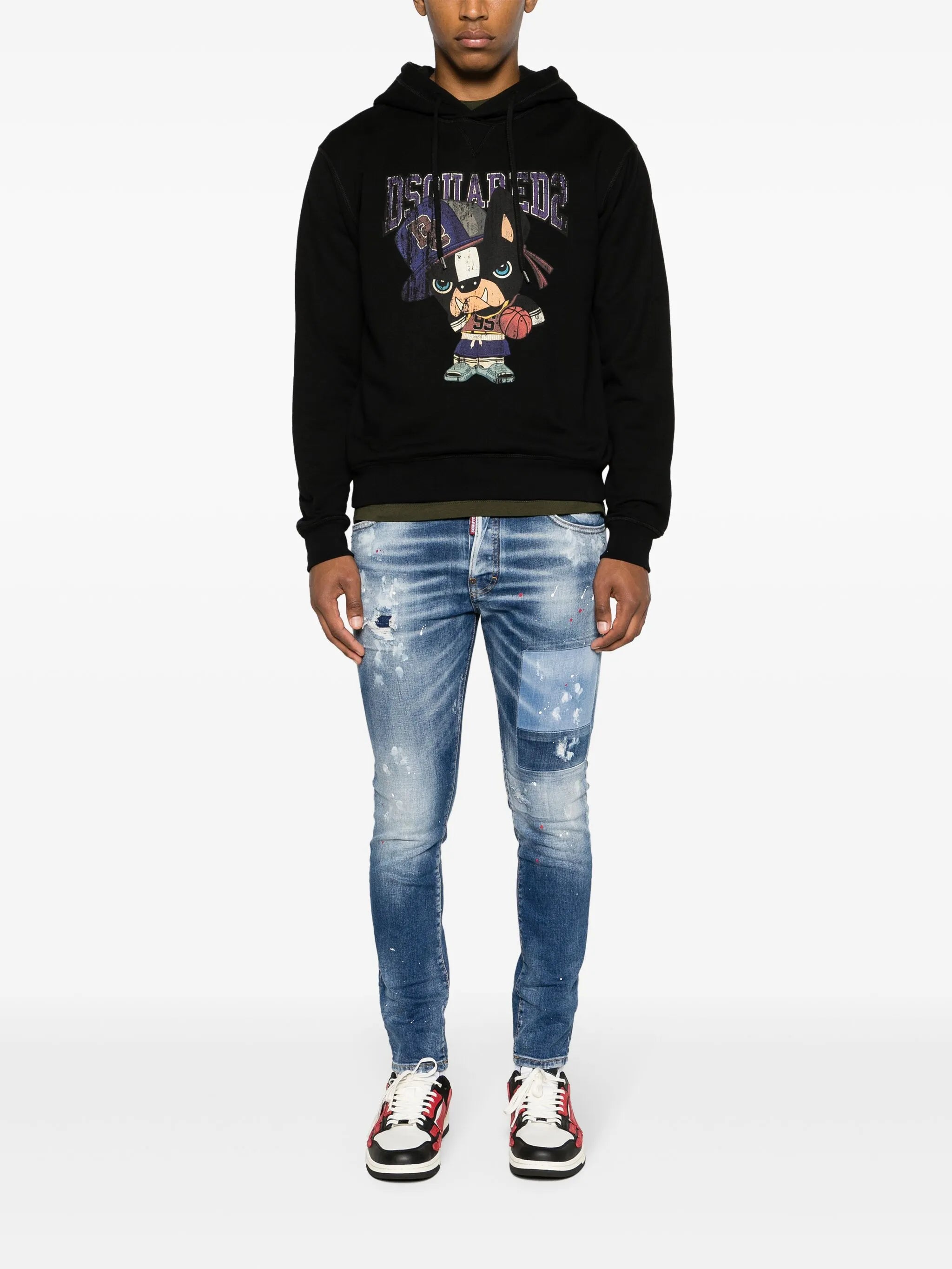 paint-splatter distressed skinny jeans