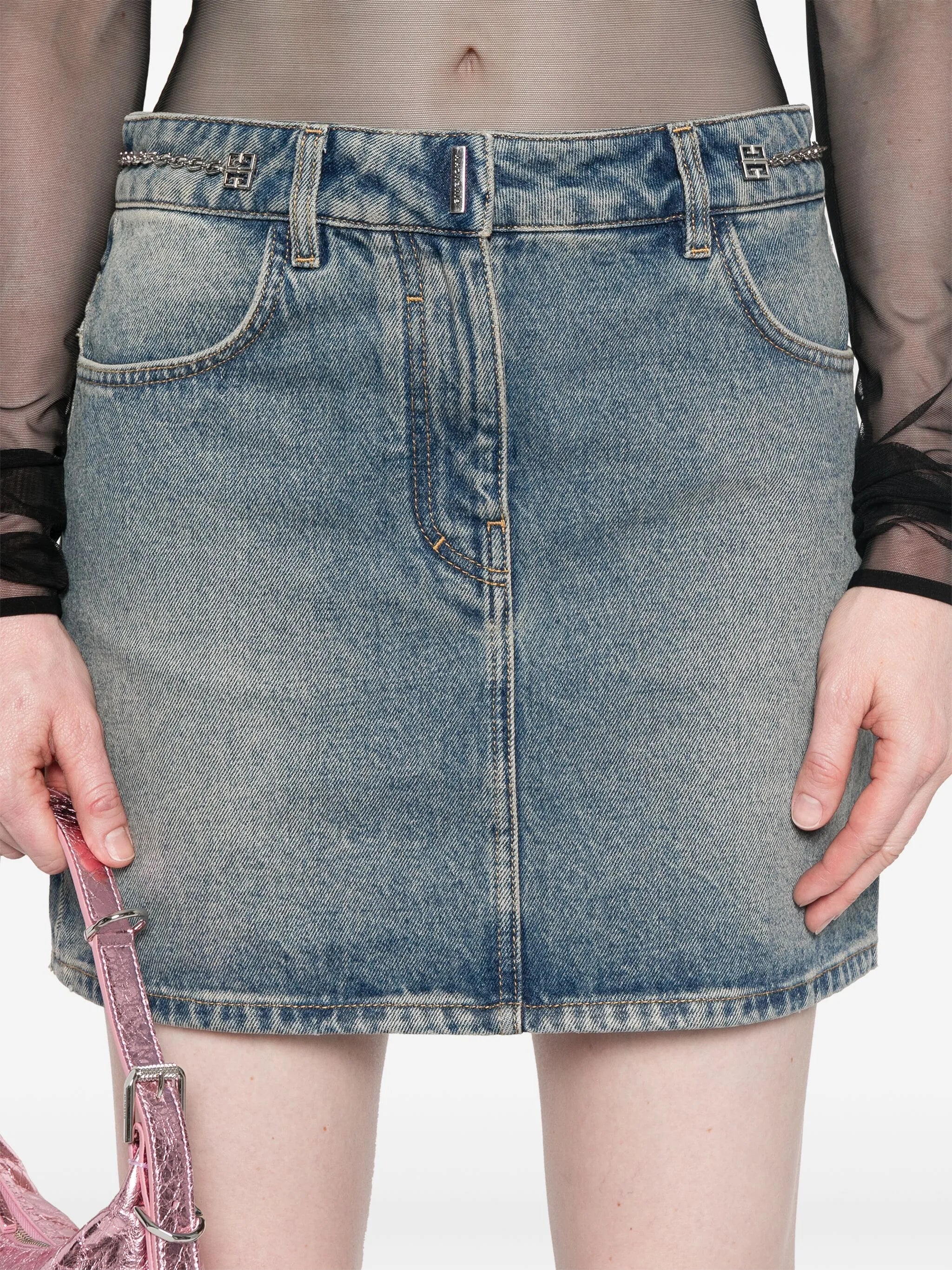 Mini skirt in denim with chain details