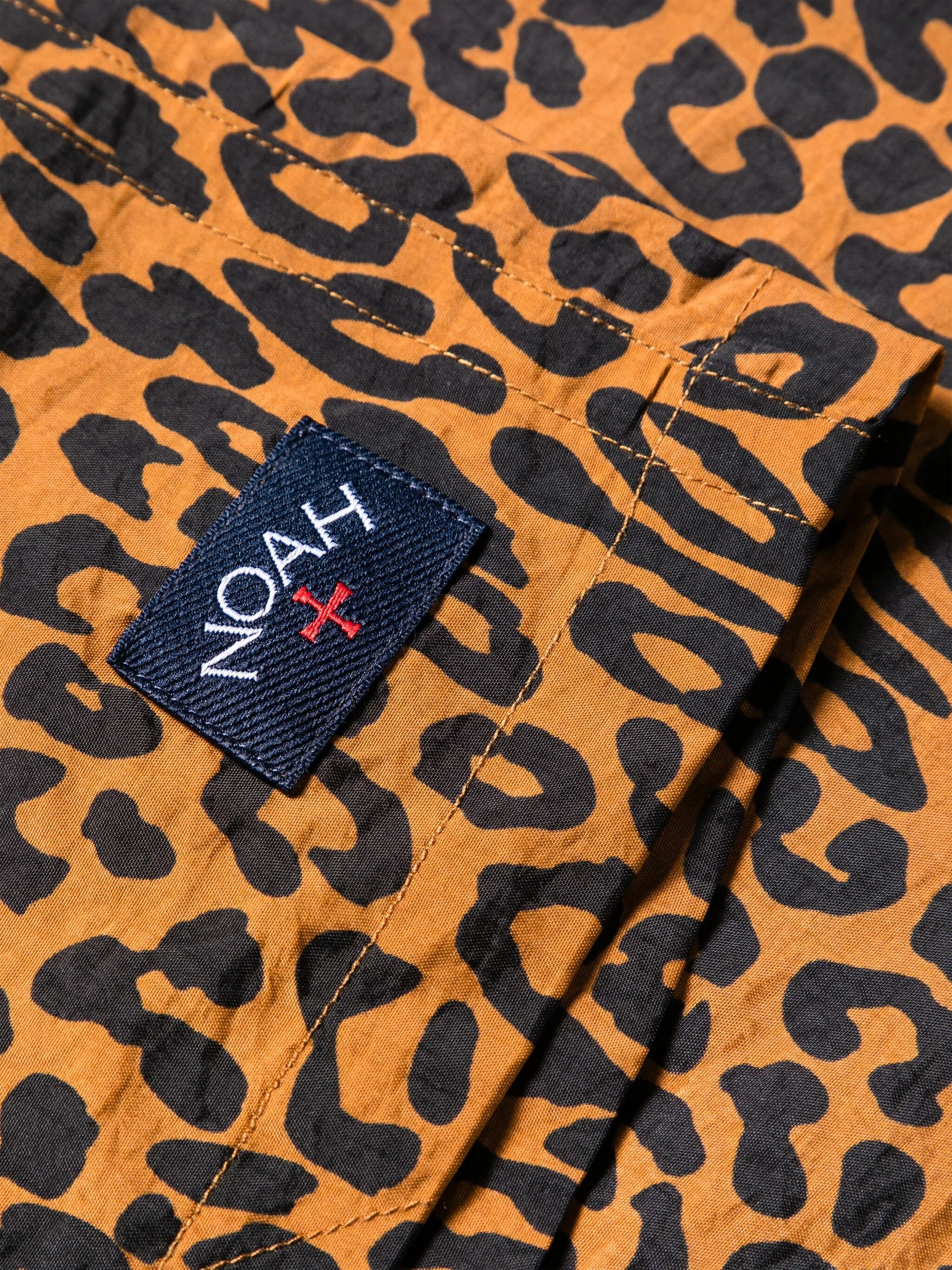 leopard-print swim shorts