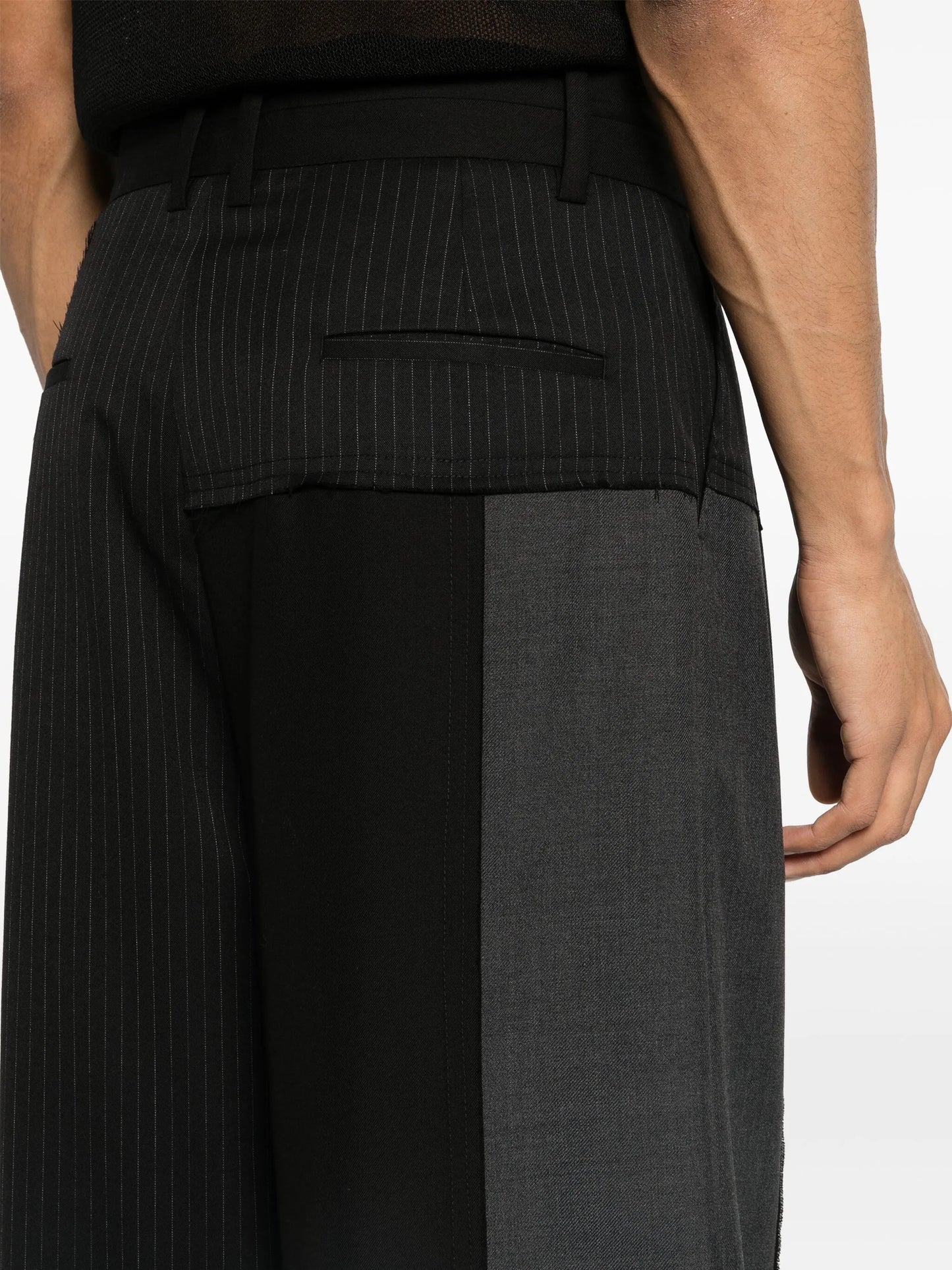 deconstructed wide-leg trousers