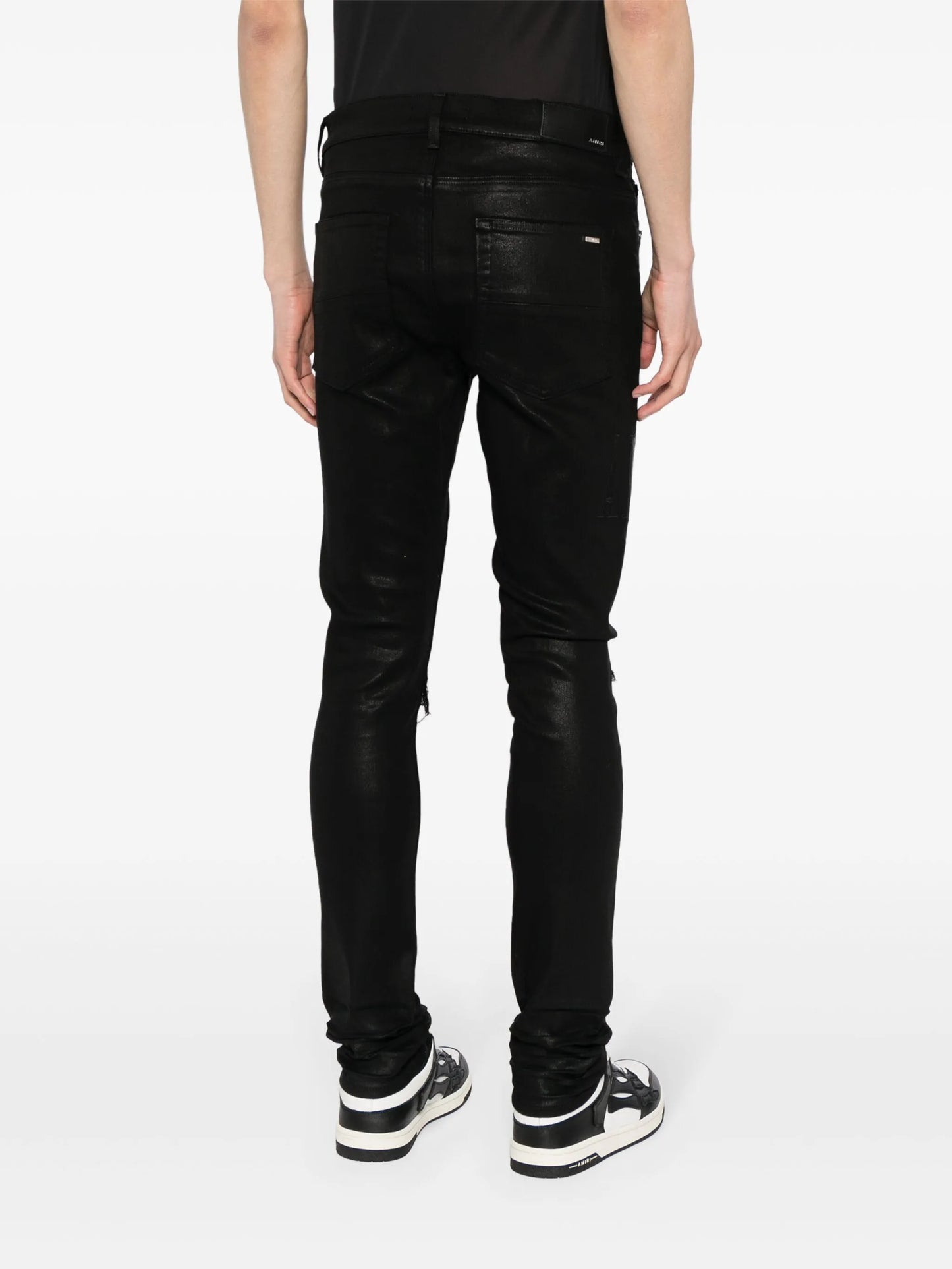 logo-embroidered distressed slim-cut jeans