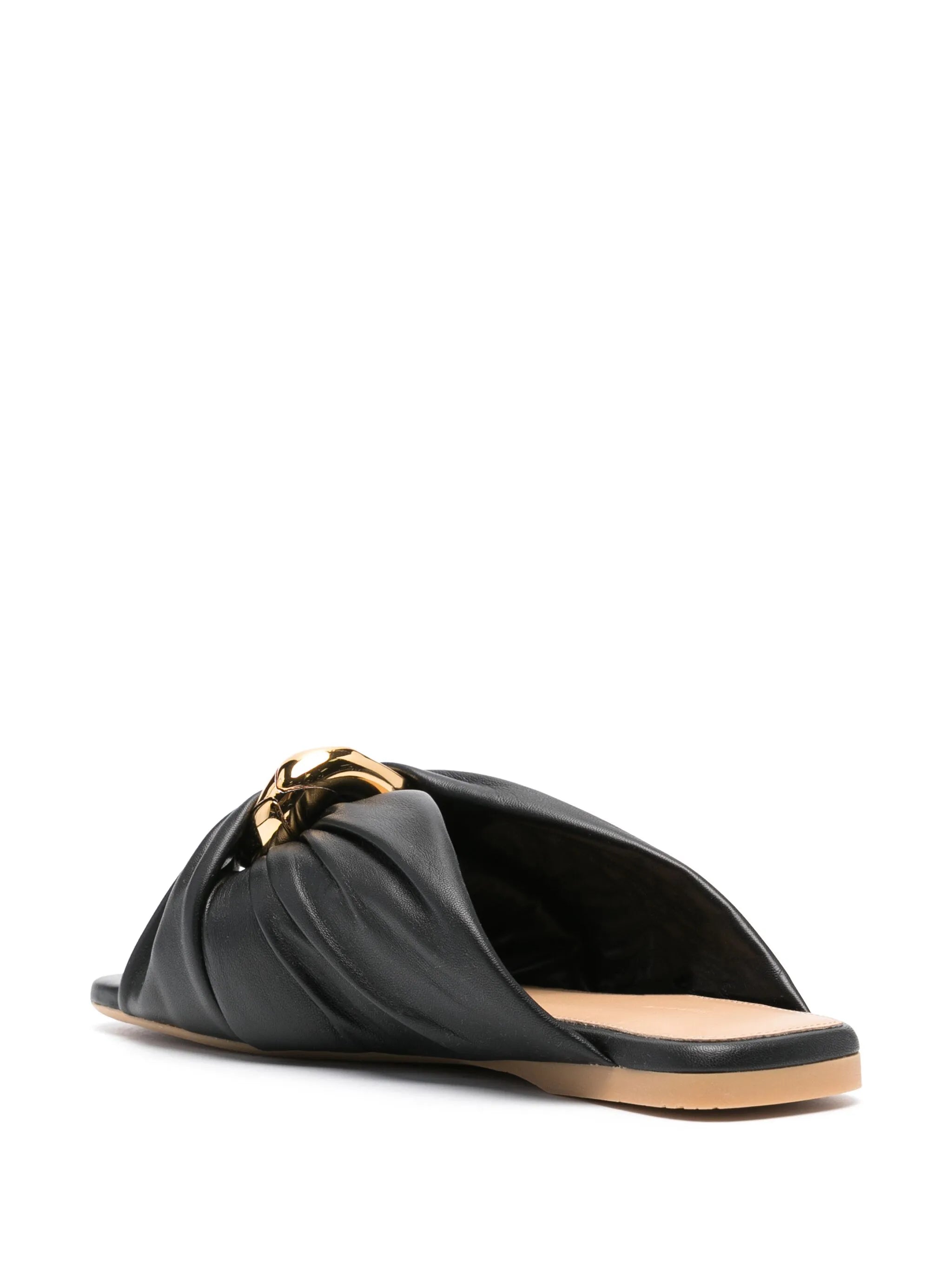 Corner leather flats