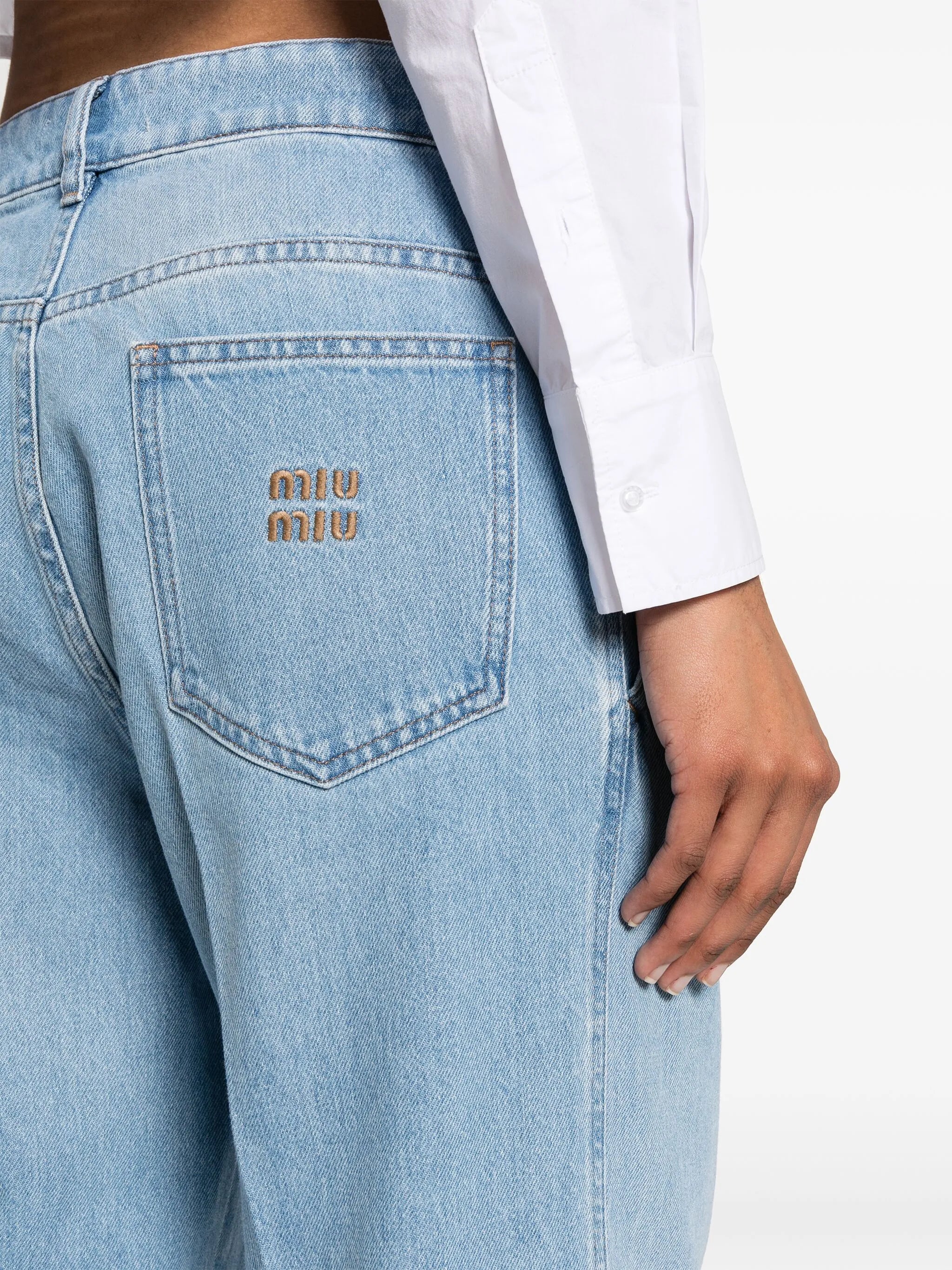 logo-embroidered tapered jeans