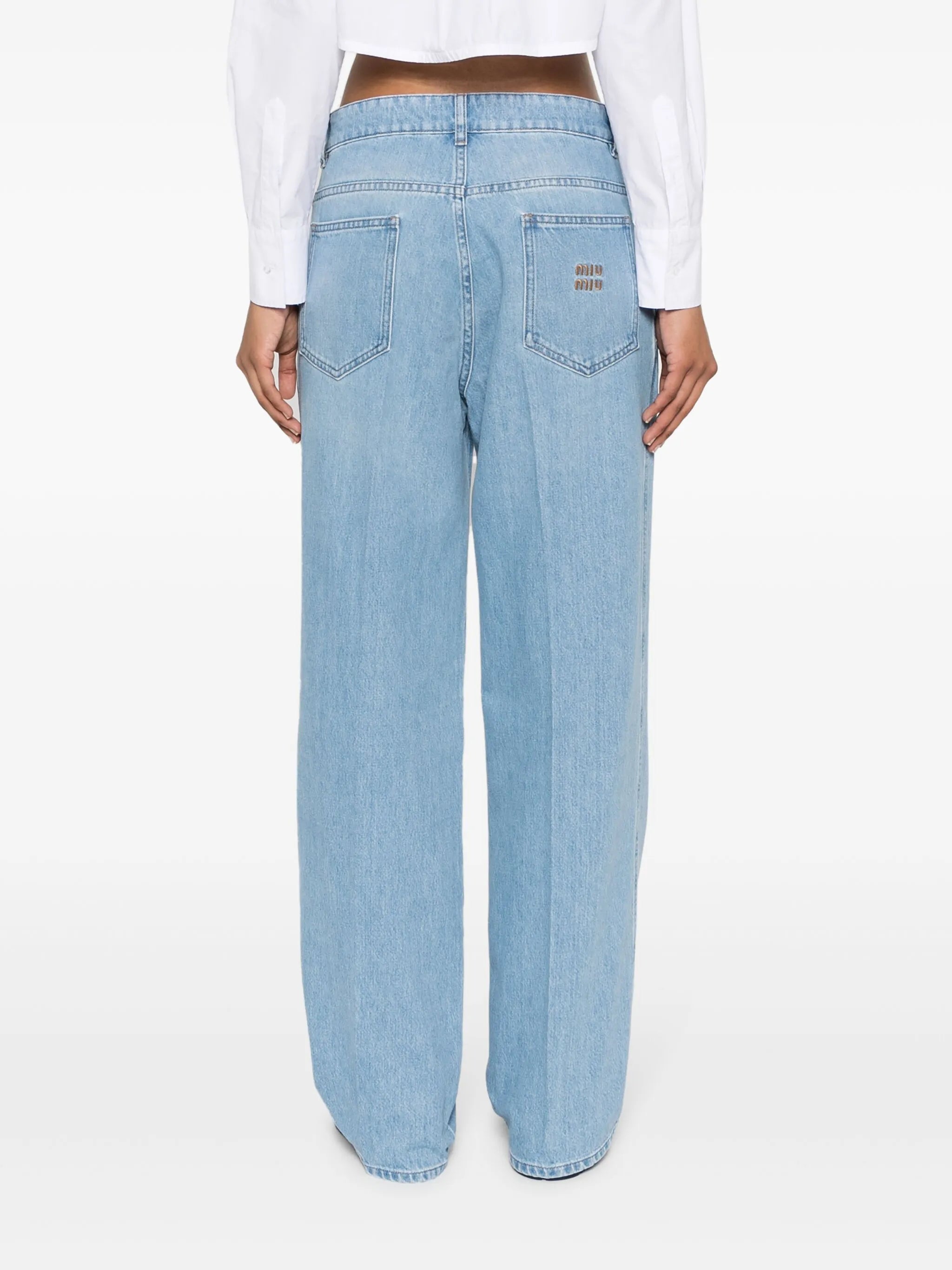 logo-embroidered tapered jeans