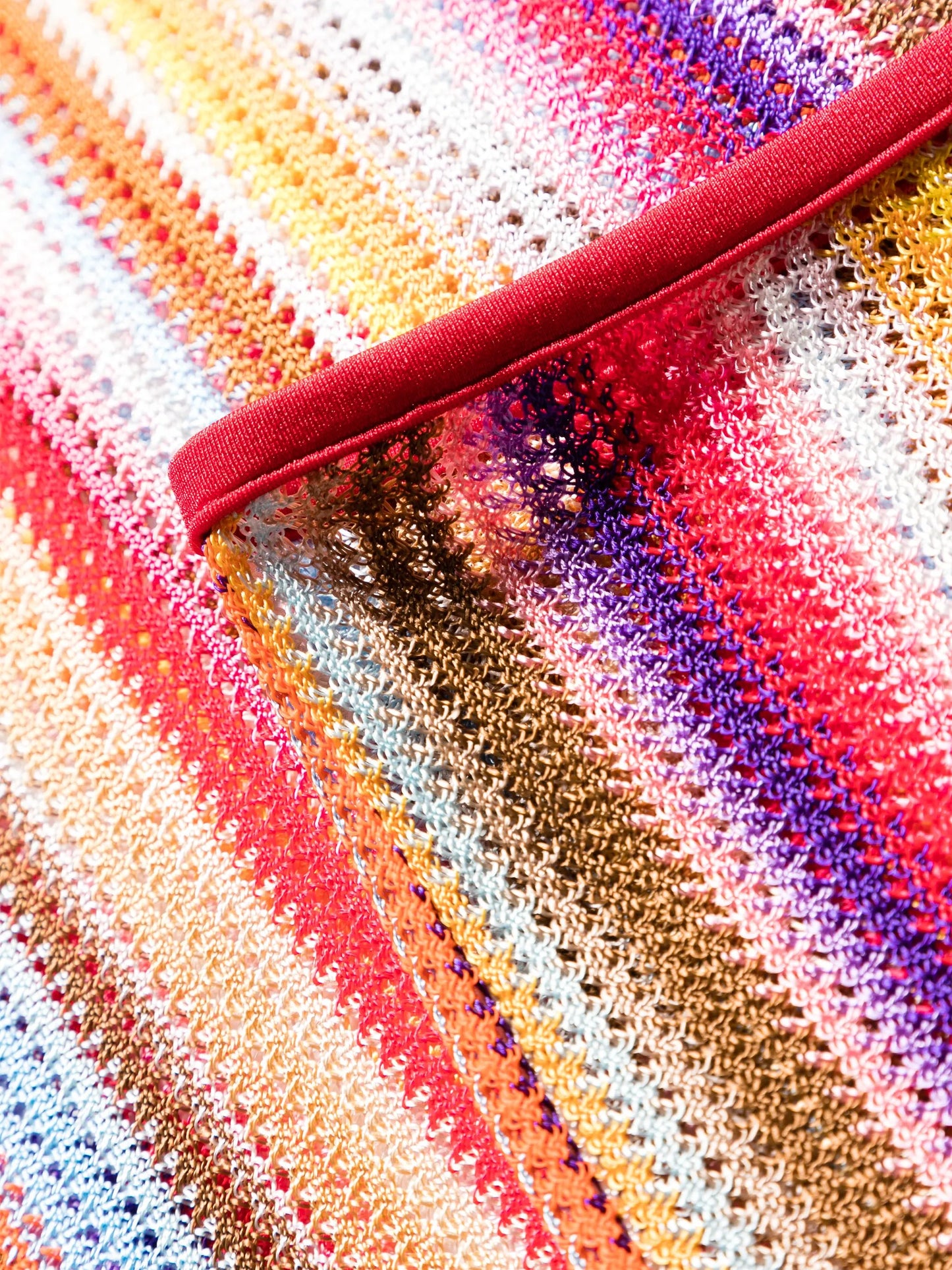 striped crochet-knit flared trousers