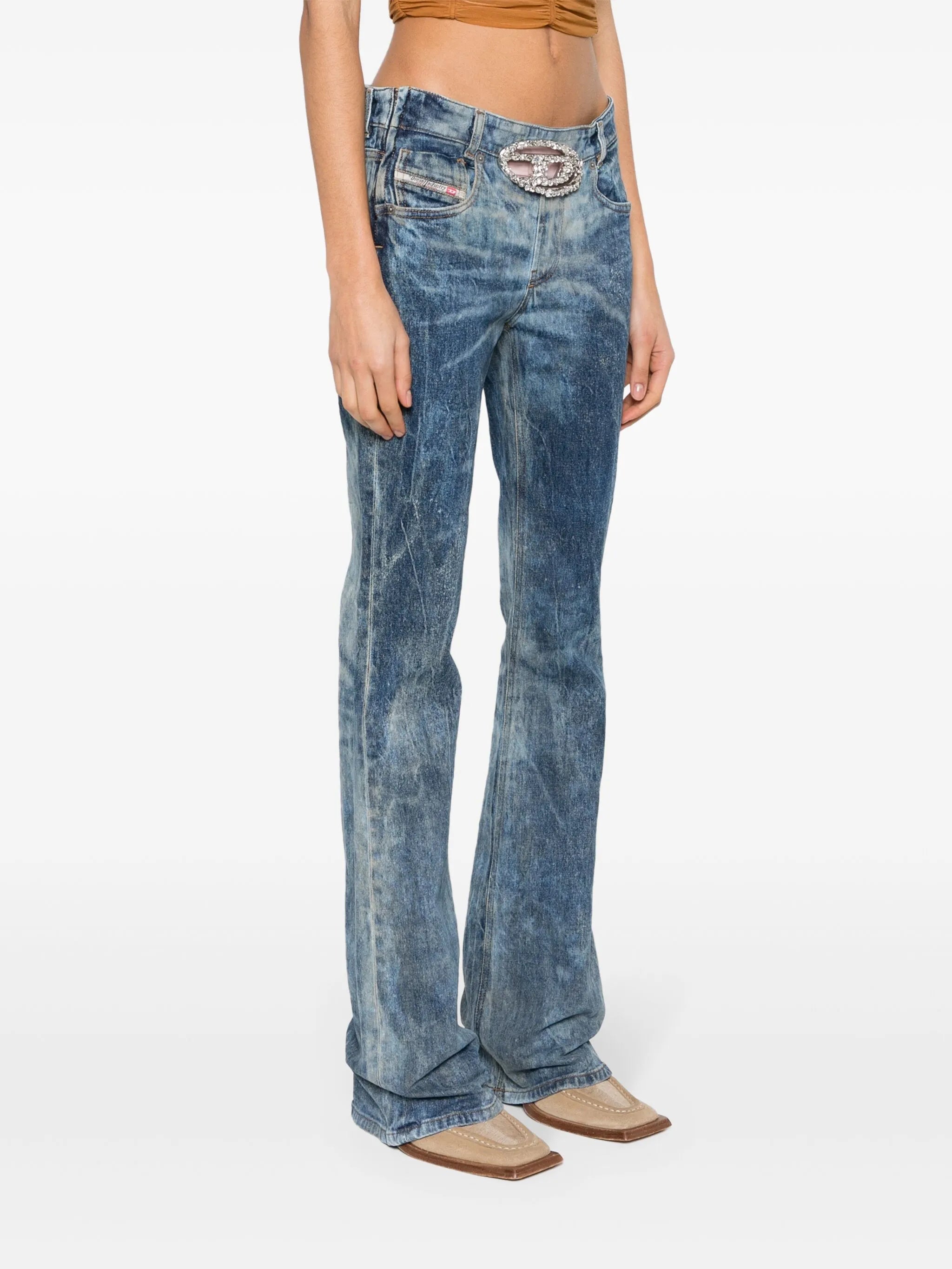 gem-logo buckle flared jeans
