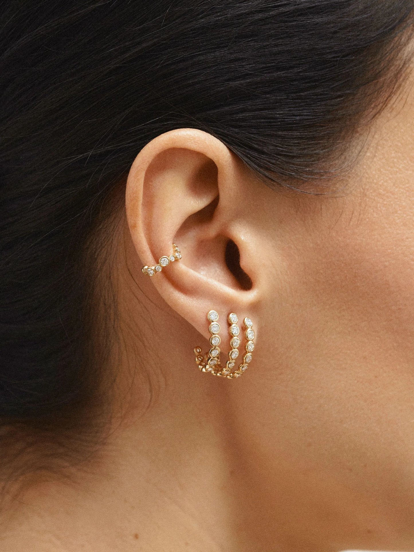 18kt yellow gold diamond semi-hoop earring