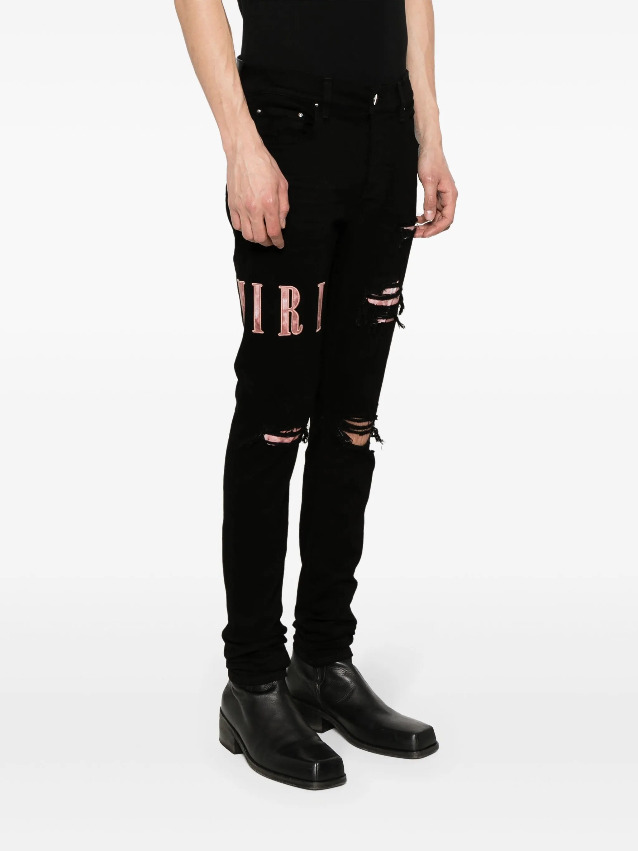 waxed logo-appliqué skinny jeans