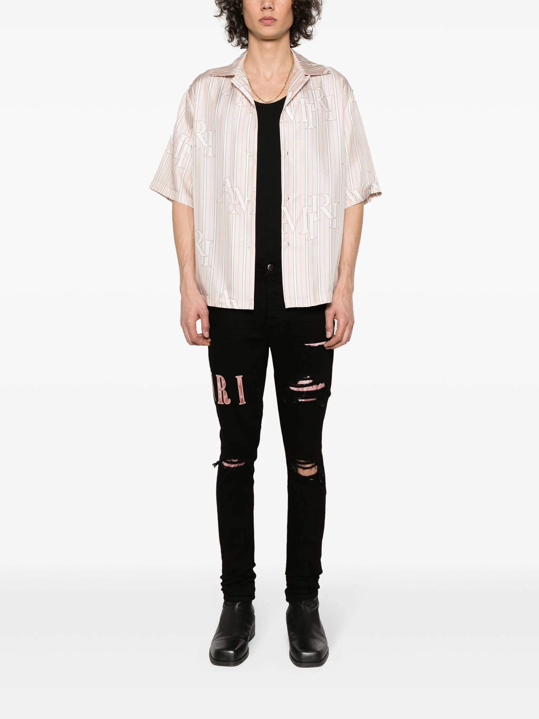 waxed logo-appliqué skinny jeans