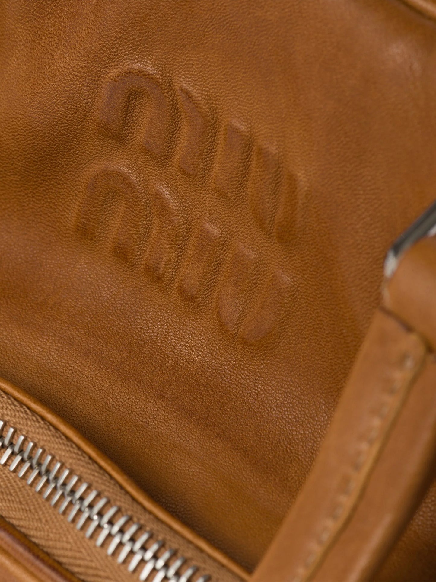 logo-embossed leather tote bag