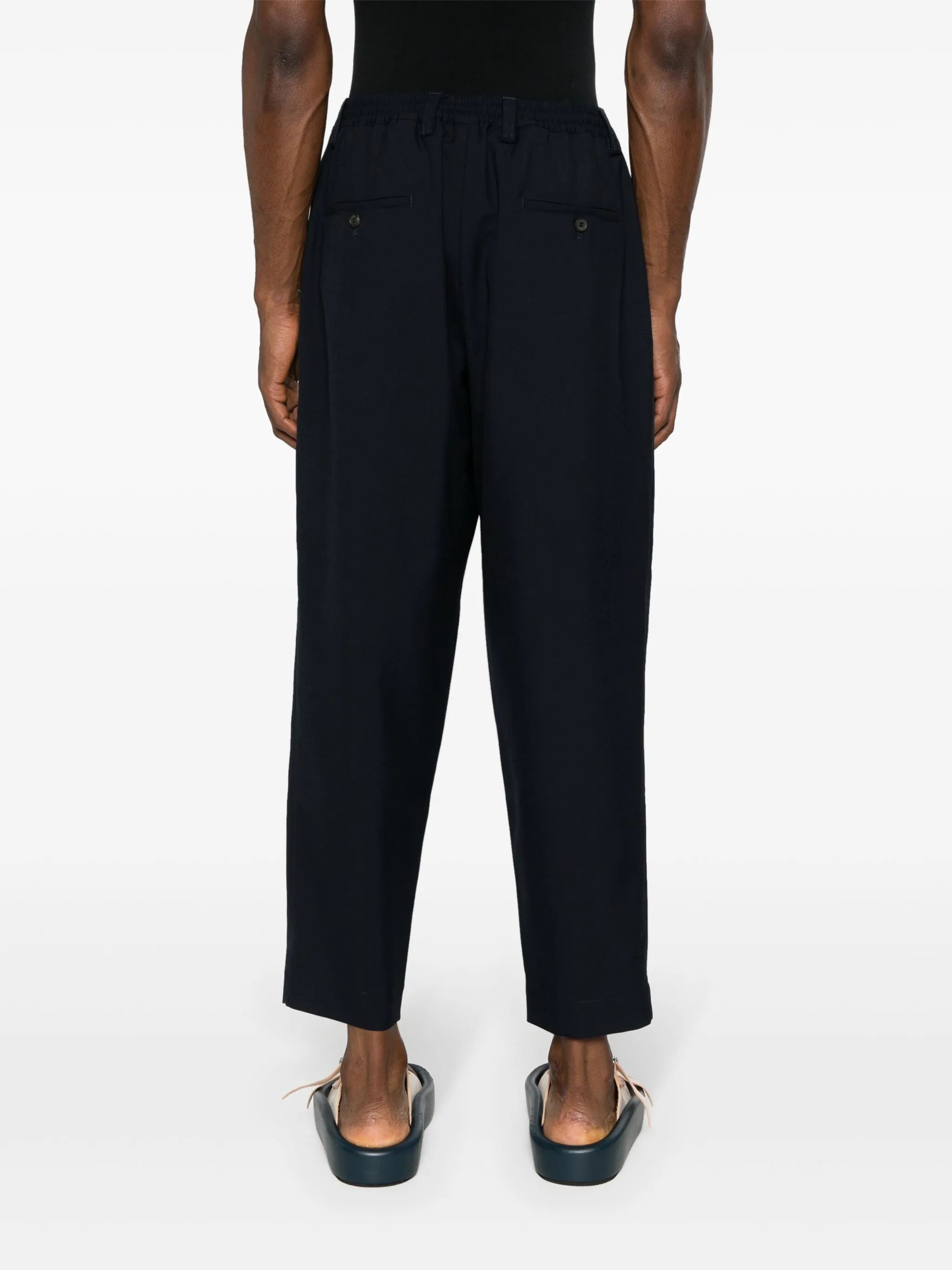 pleat-detail tapered trousers