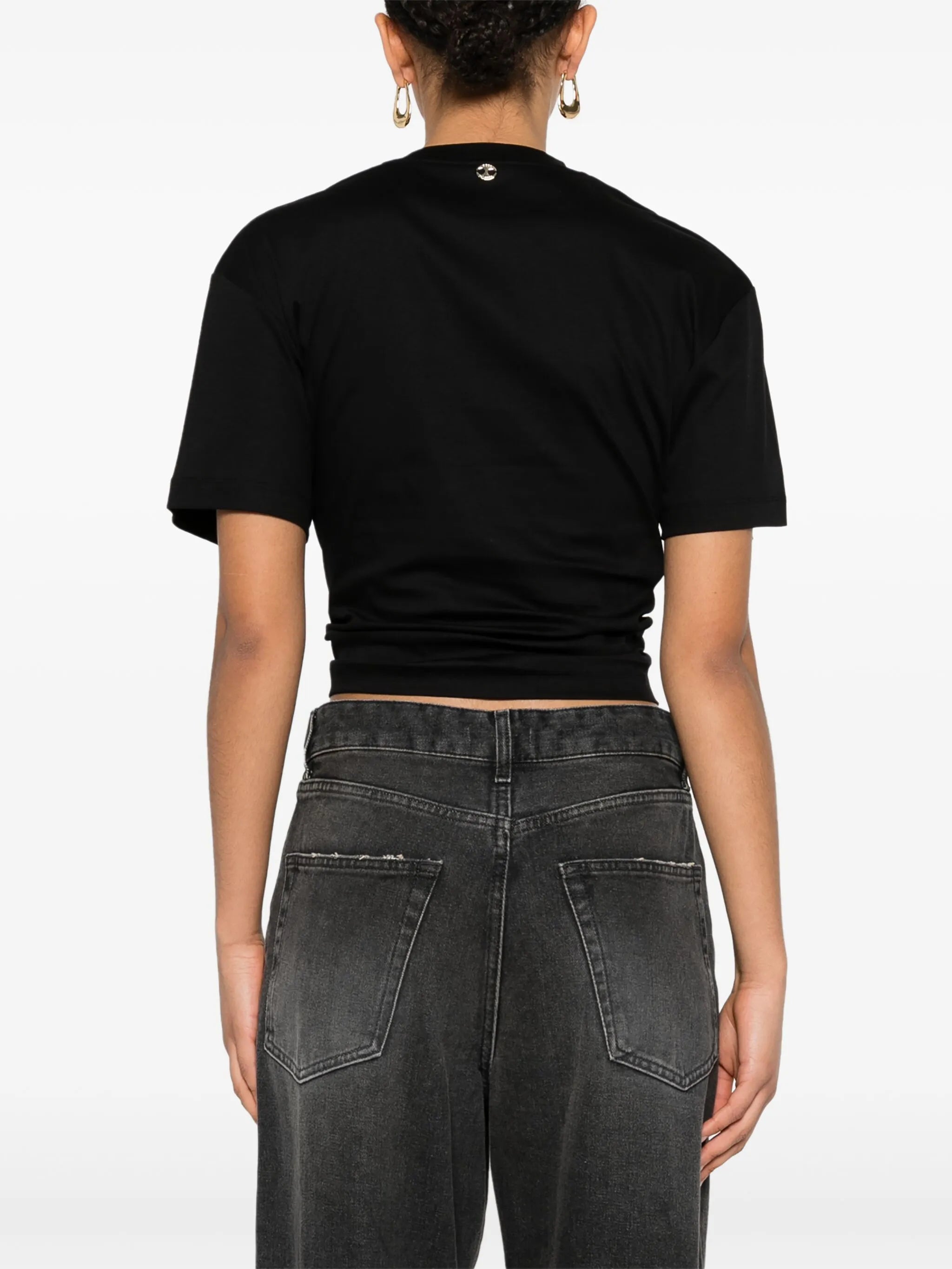 T-shirt in black cotton with signature piercing detail