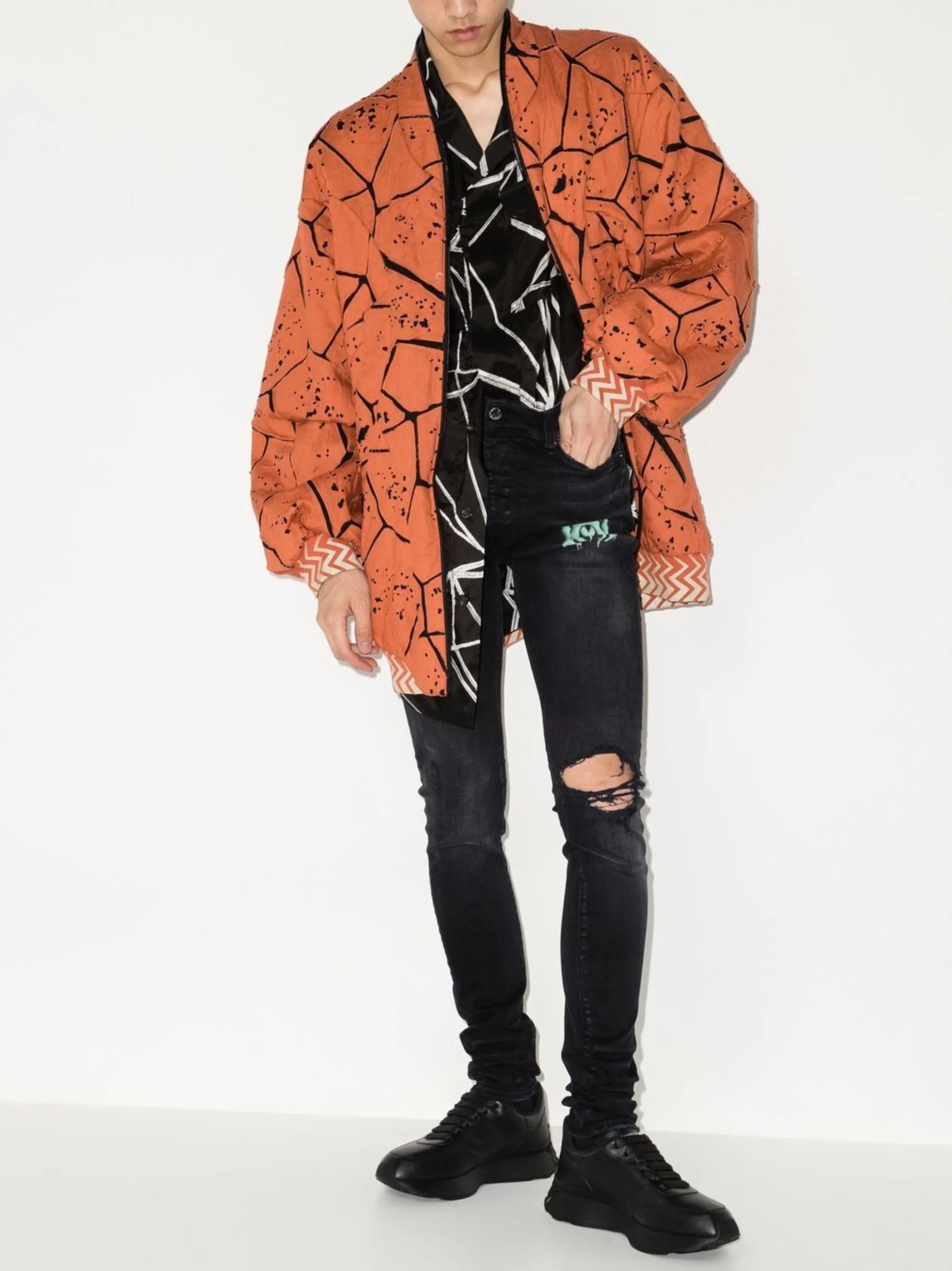 Watercolour logo-print skinny jeans