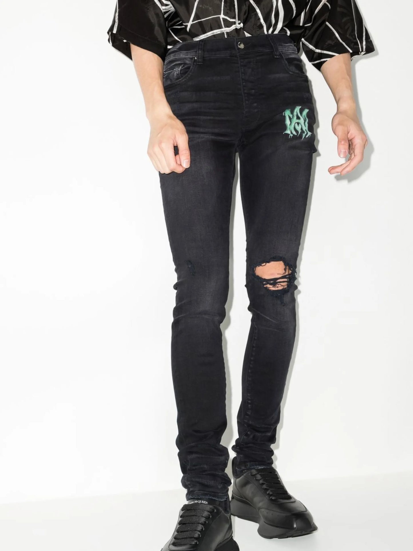 Watercolour logo-print skinny jeans