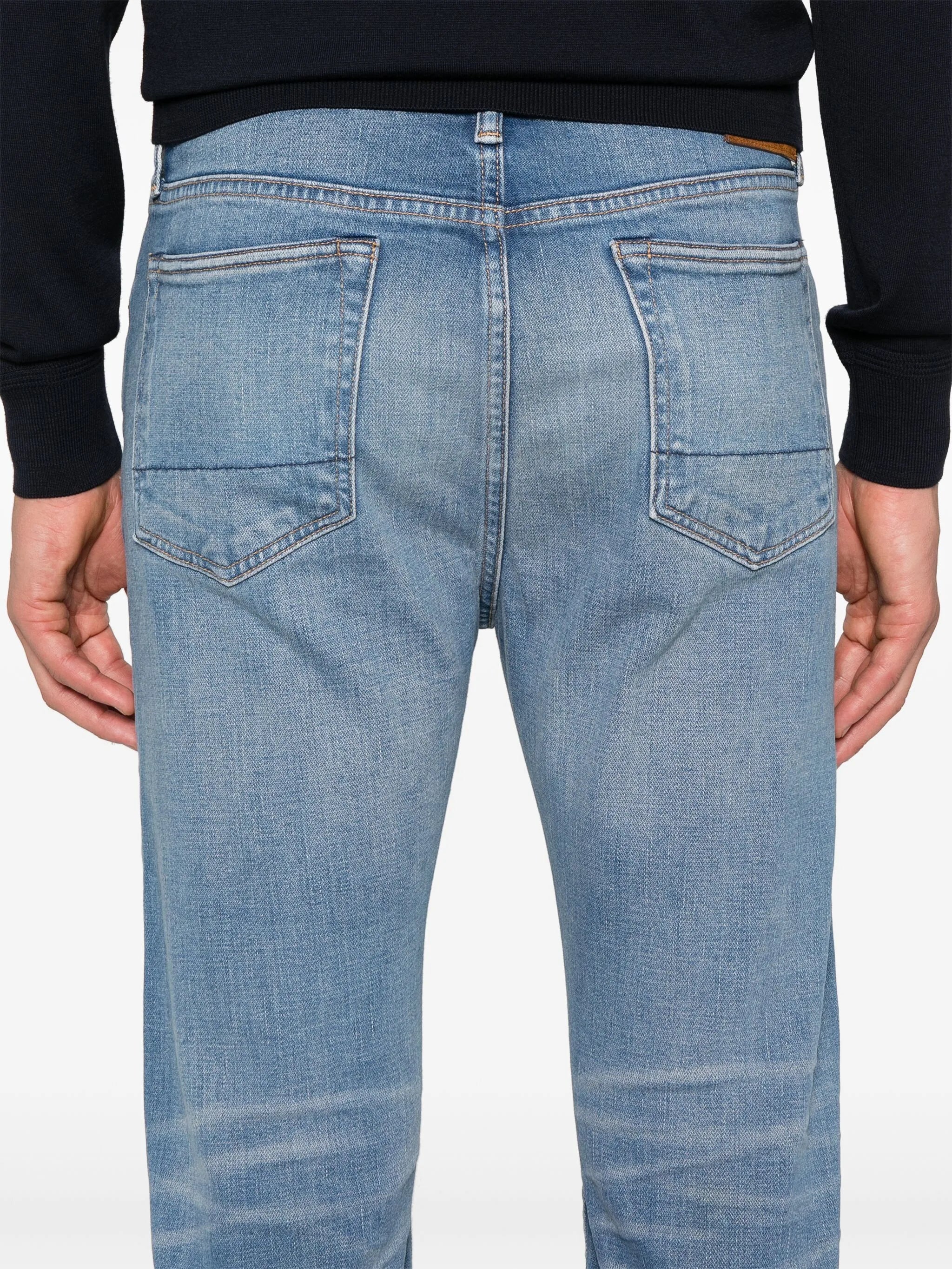Broken slim-cut jeans