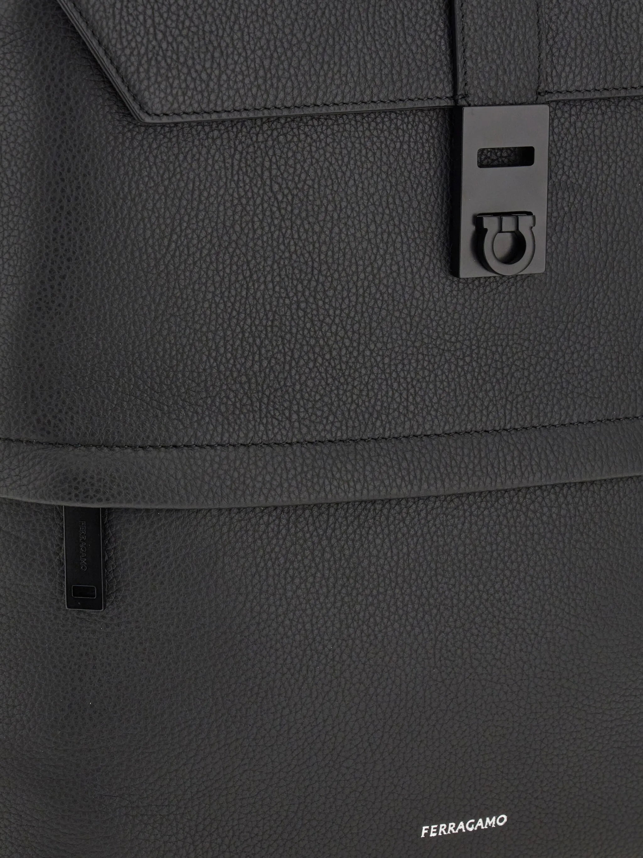Hug-buckle leather backpack