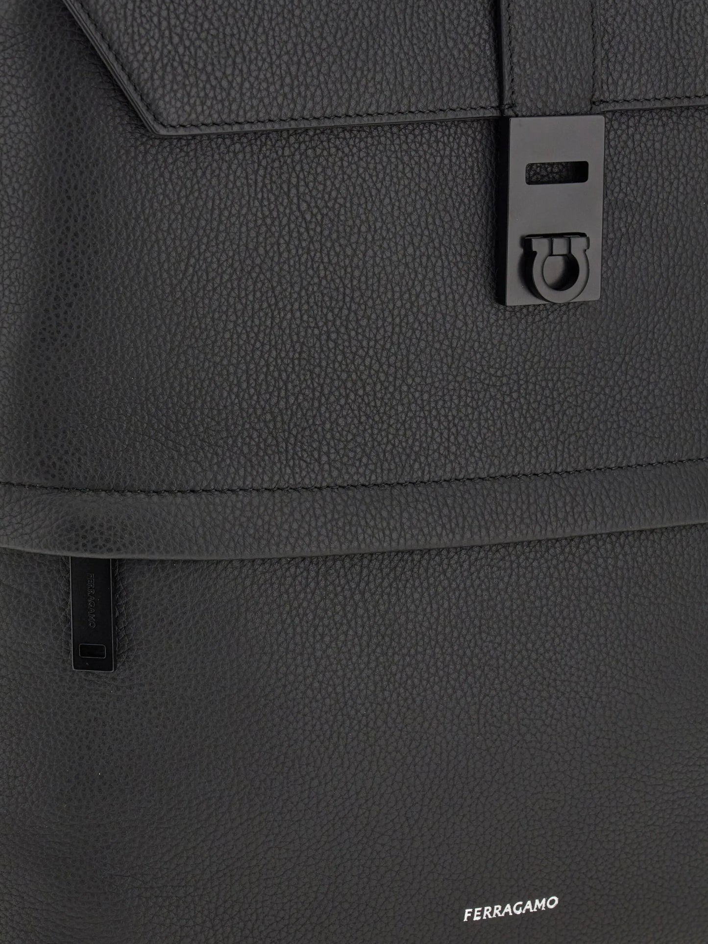 Hug-buckle leather backpack