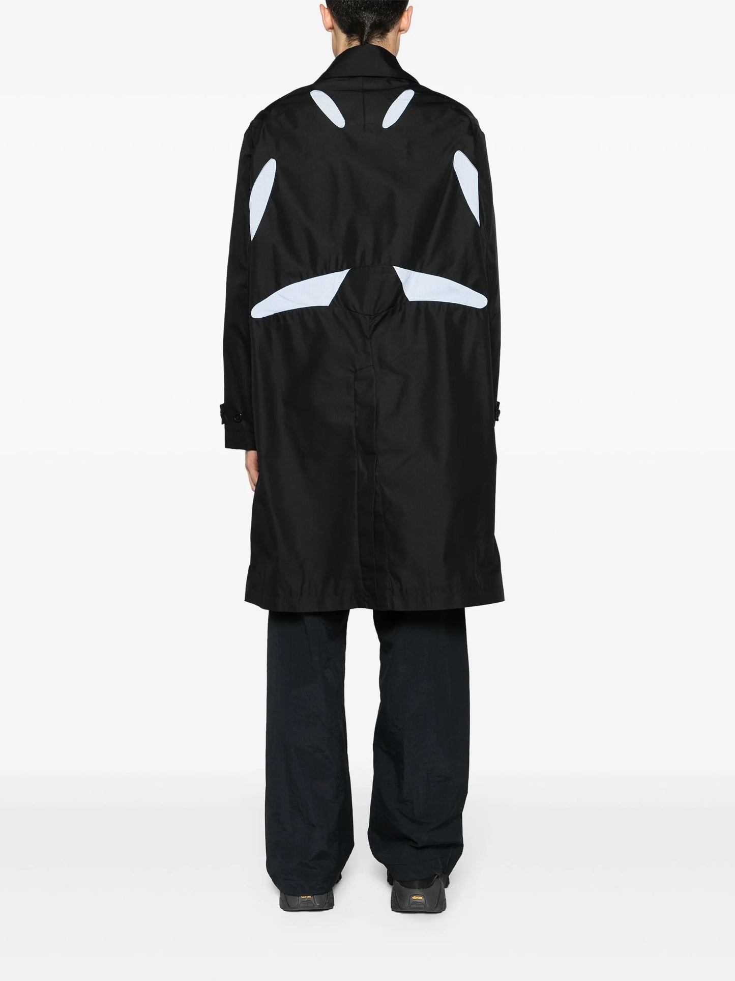 Aperture cut-out trench coat