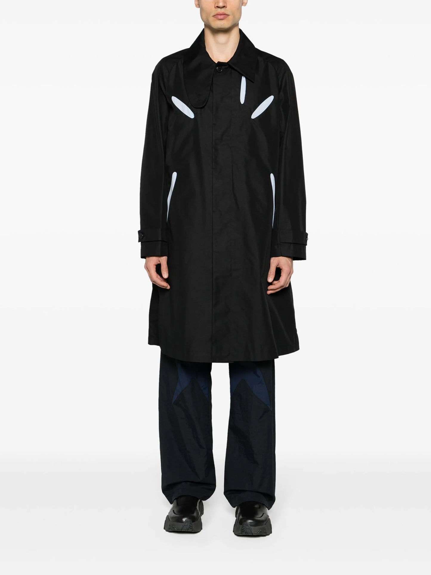 Aperture cut-out trench coat