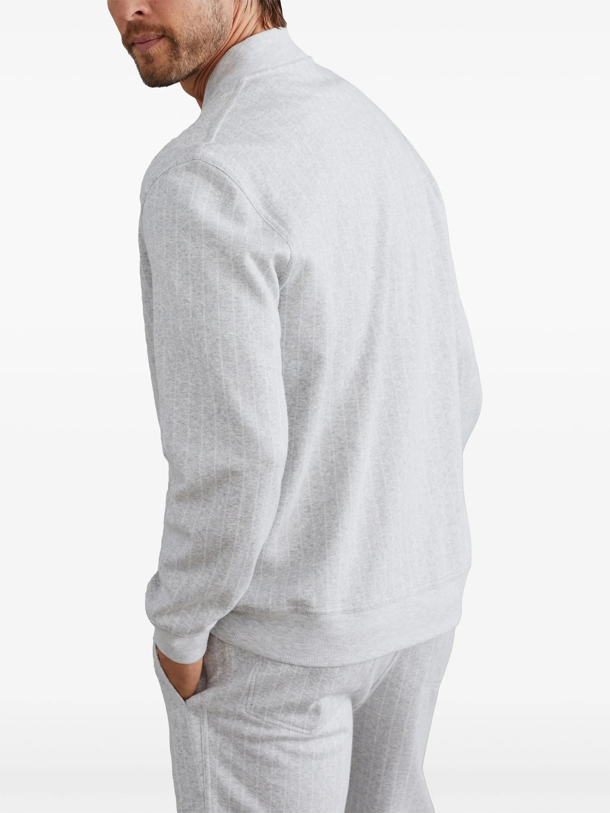 zip-up striped sweatshirt