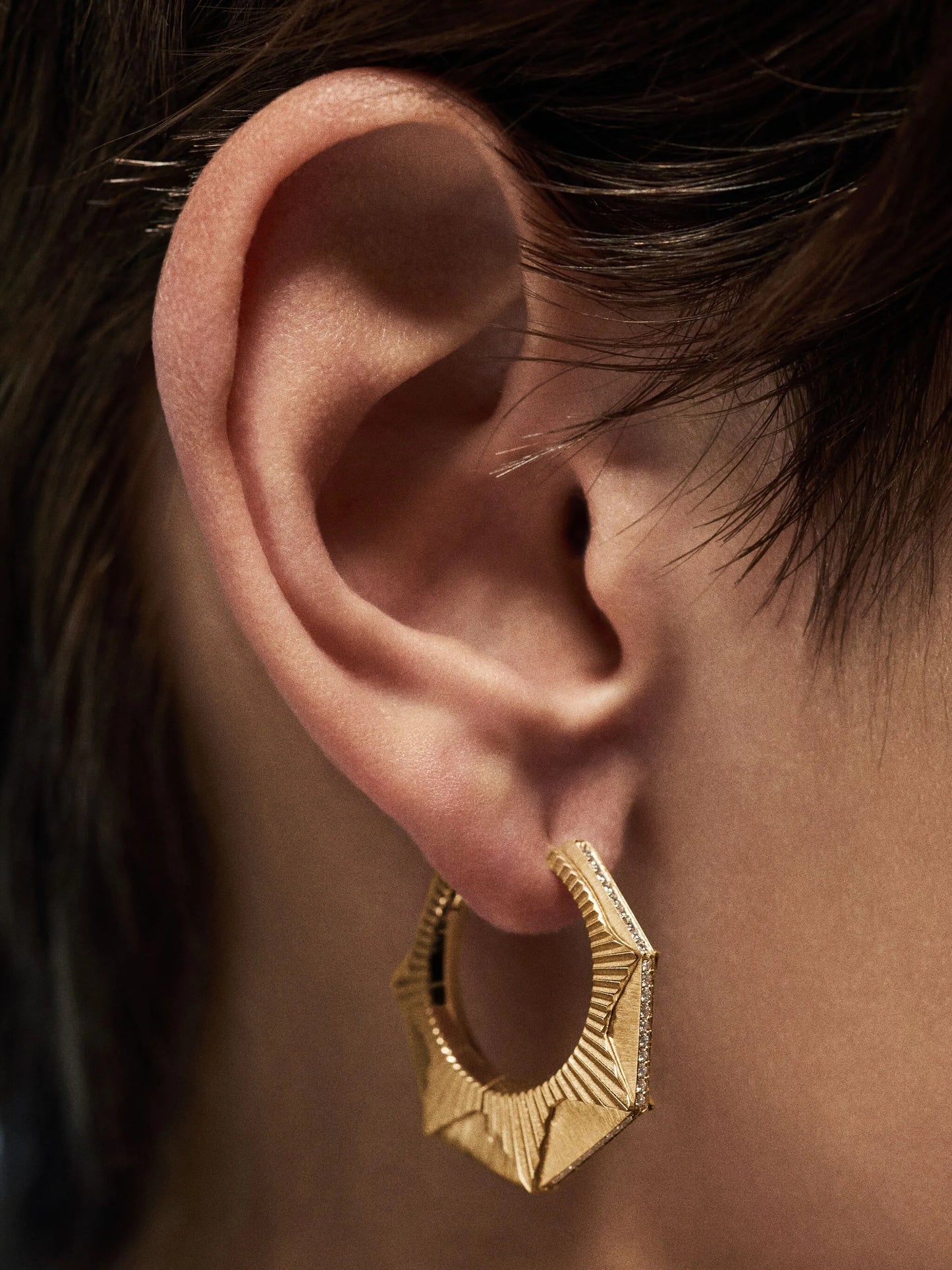 18kt yellow gold NYC GM diamond hoop earring