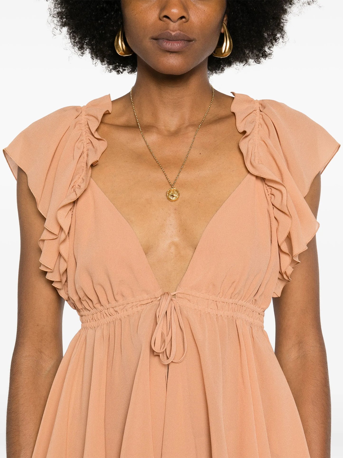 ruffled sleeveless silk blouse