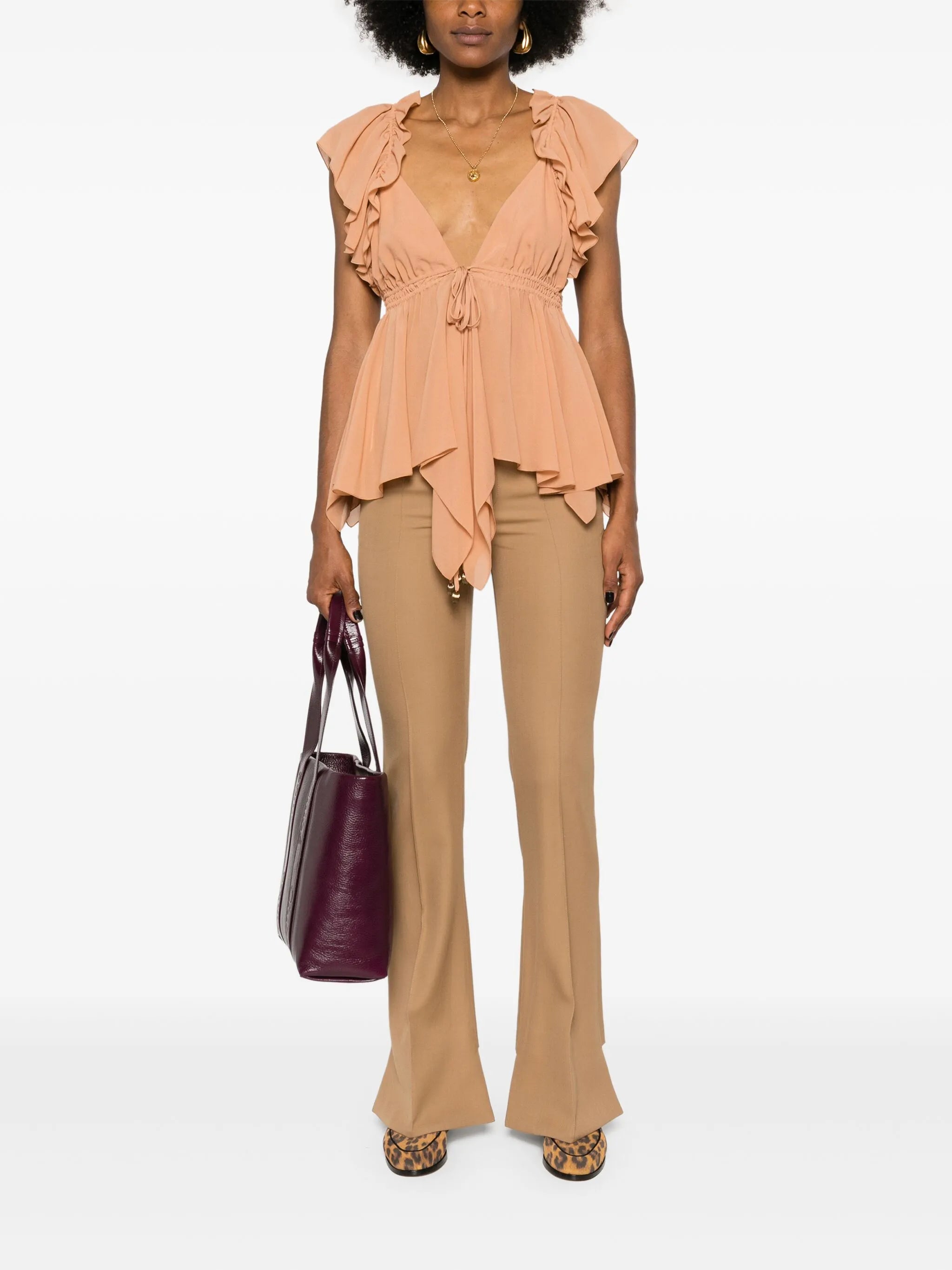 ruffled sleeveless silk blouse